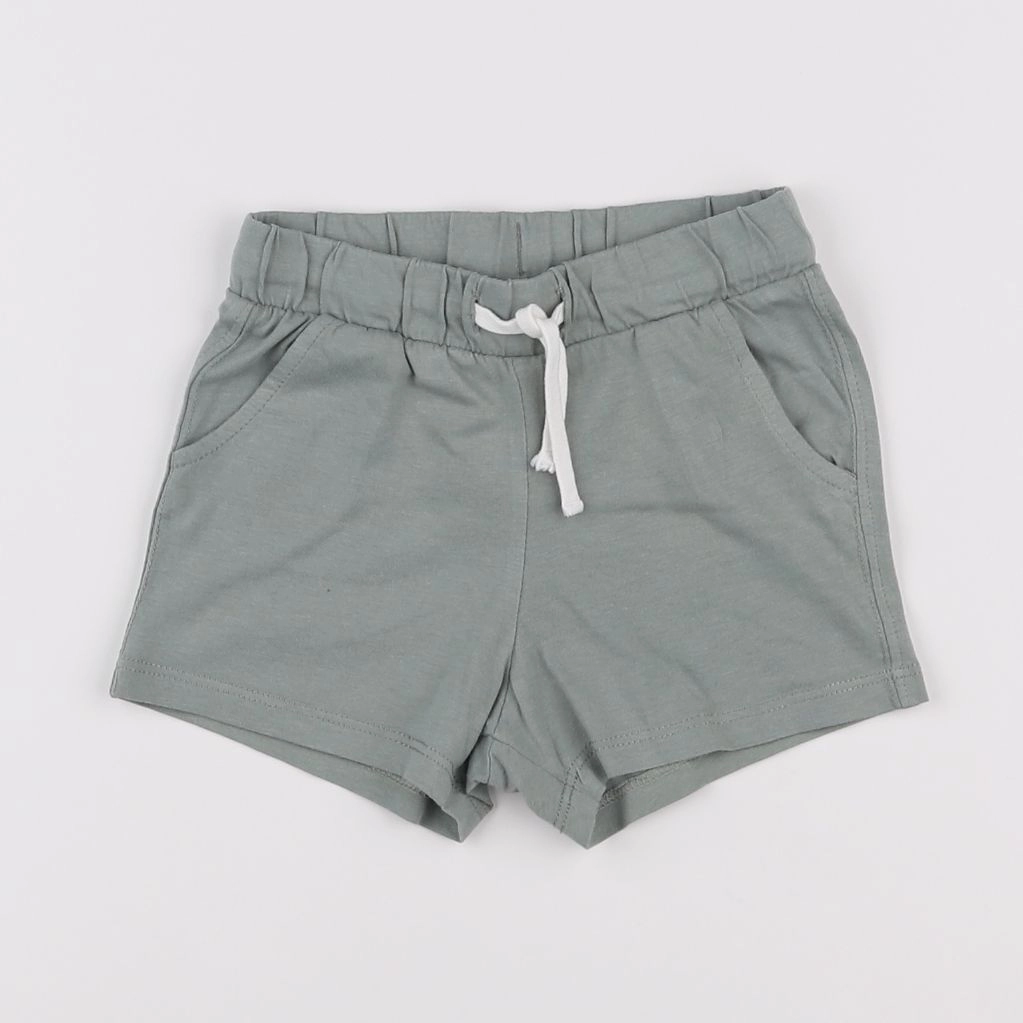 H&M - short vert - 9/12 mois