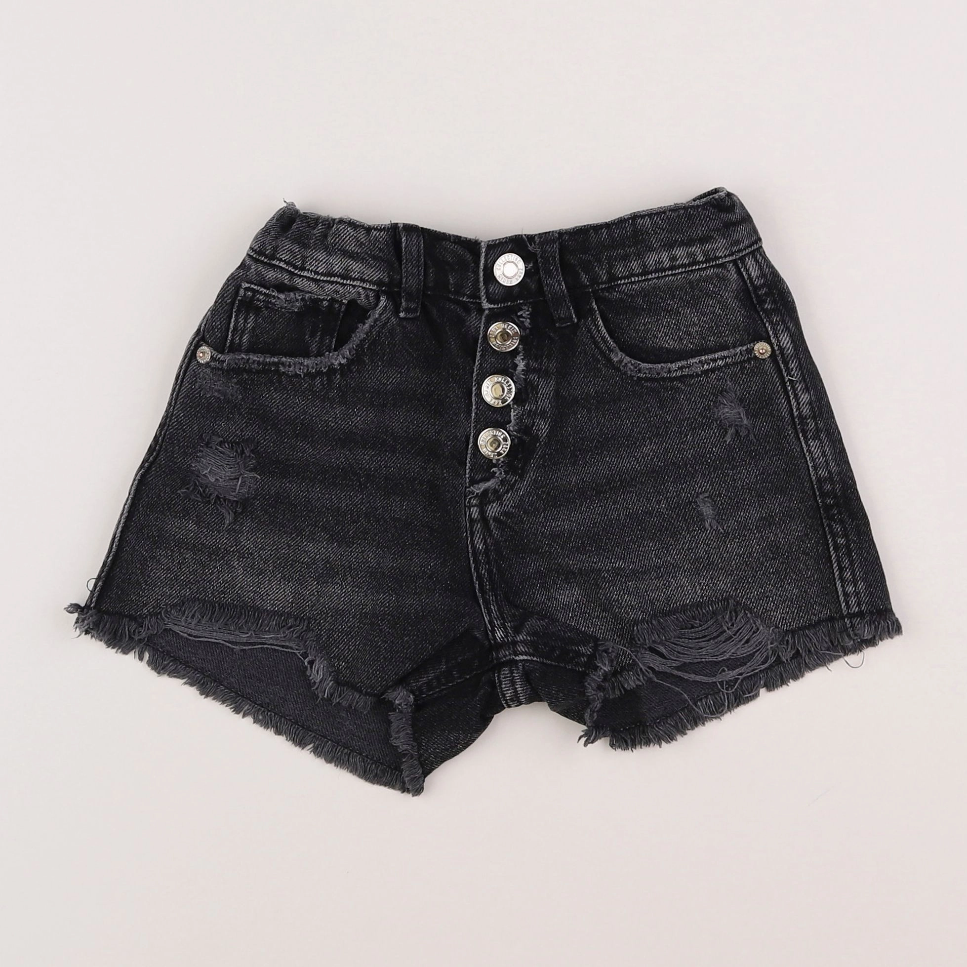 Zara - short noir - 7 ans