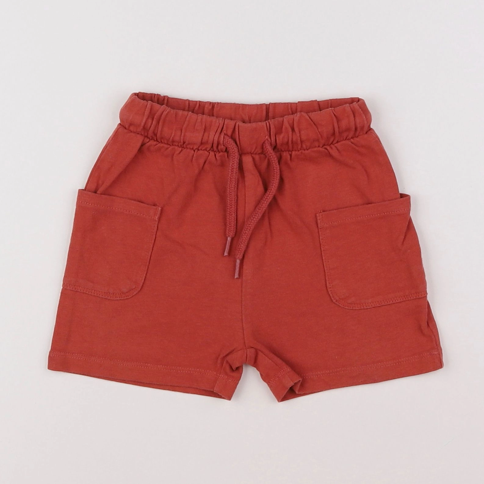 Vertbaudet - short rouge - 12 mois