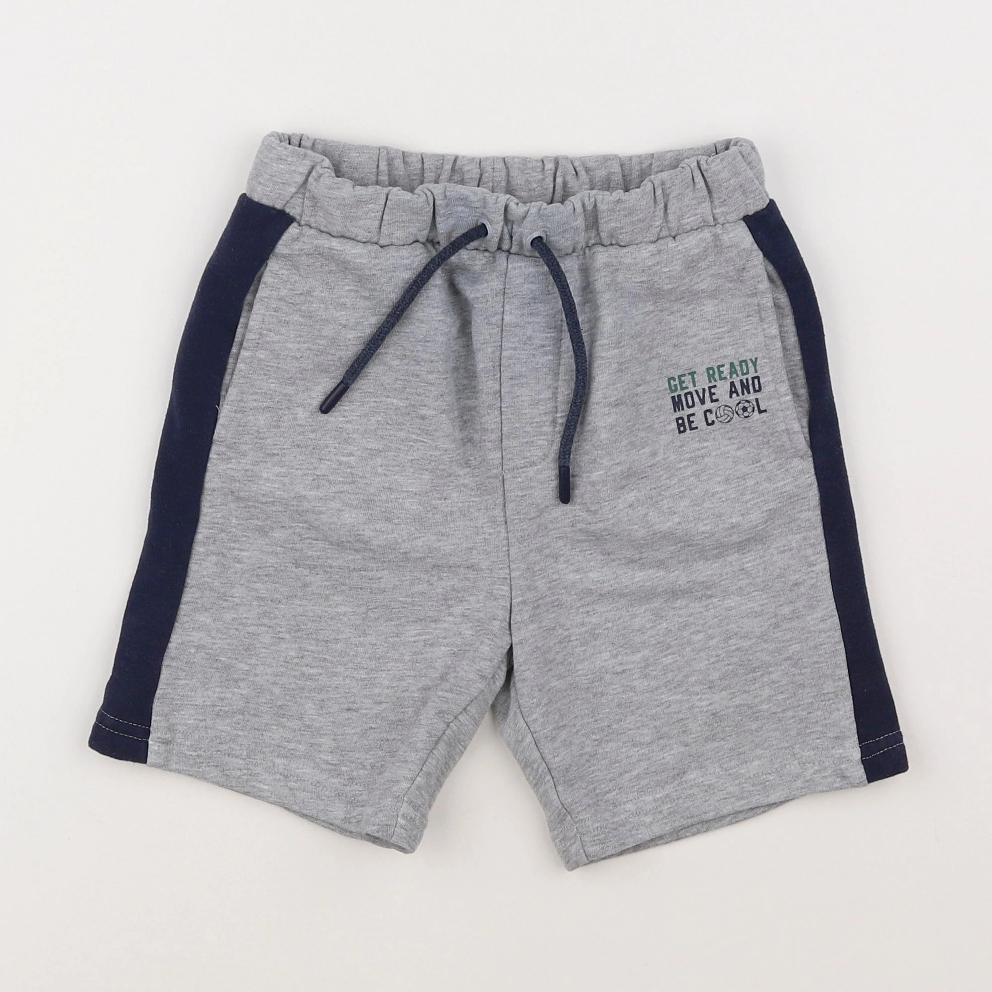 Vertbaudet - short gris - 7 ans