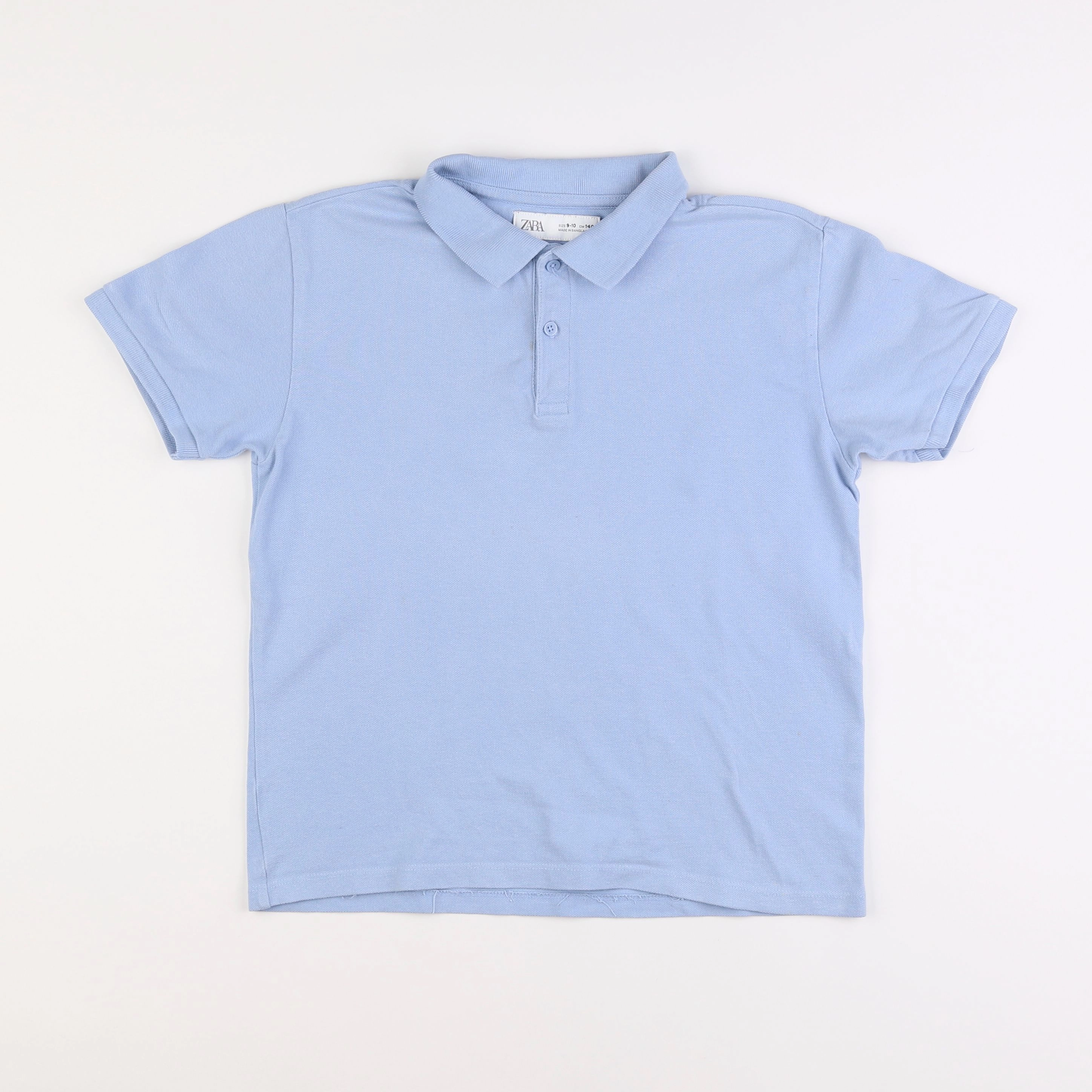Zara - polo bleu - 9/10 ans