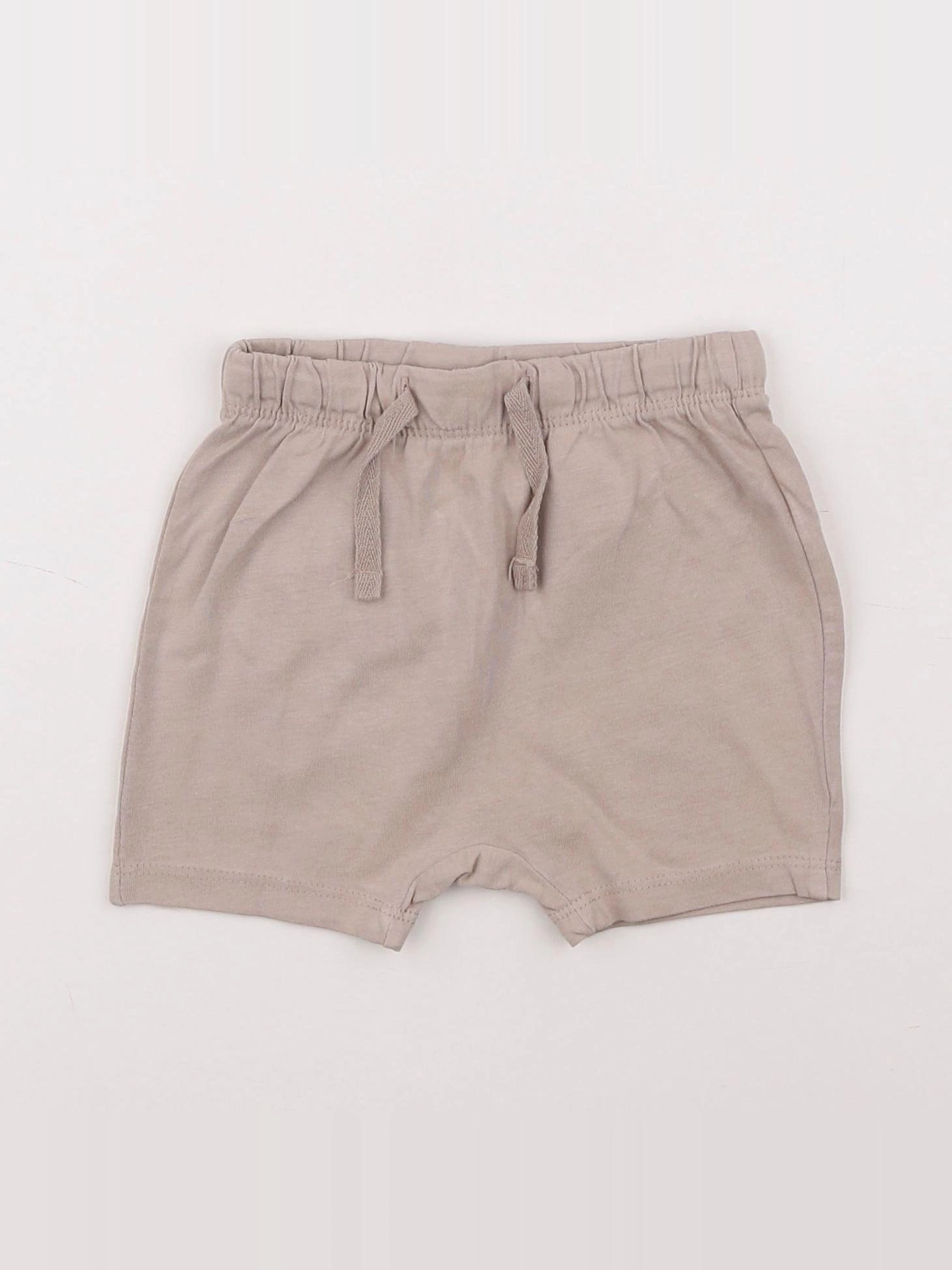 H&M - short beige - 6 mois