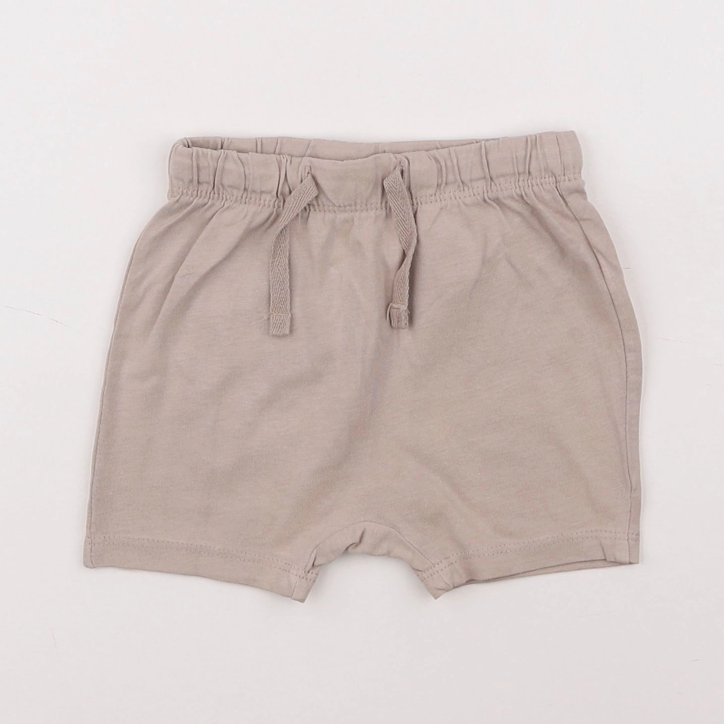H&M - short beige - 6 mois