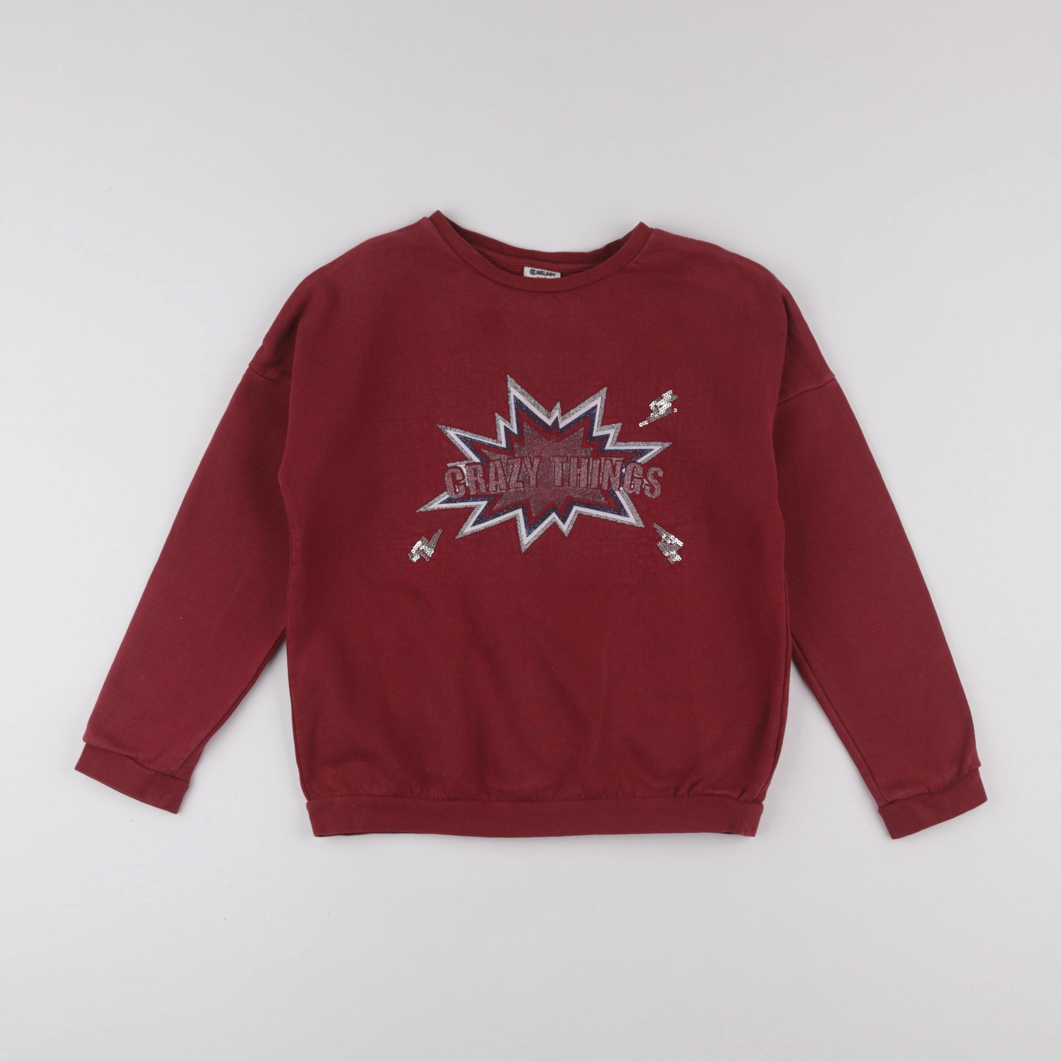 Tape à l'oeil - sweat rouge - 10 ans