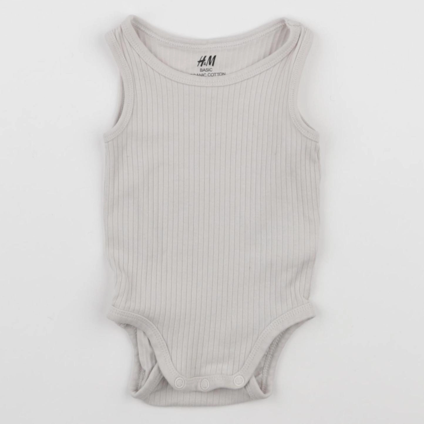 H&M - body beige - 3 mois