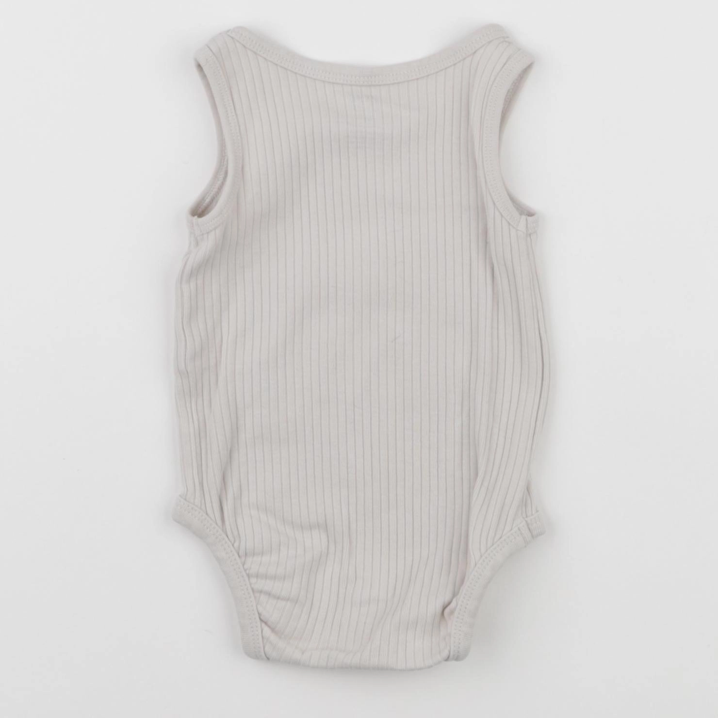 H&M - body beige - 3 mois