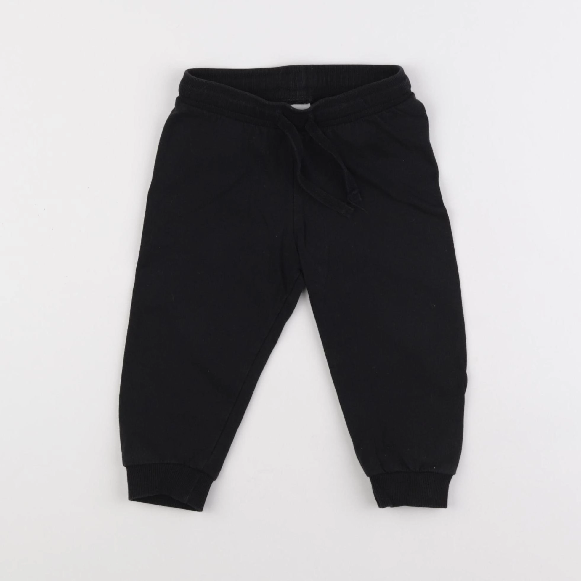 H&M - jogging noir - 12 mois