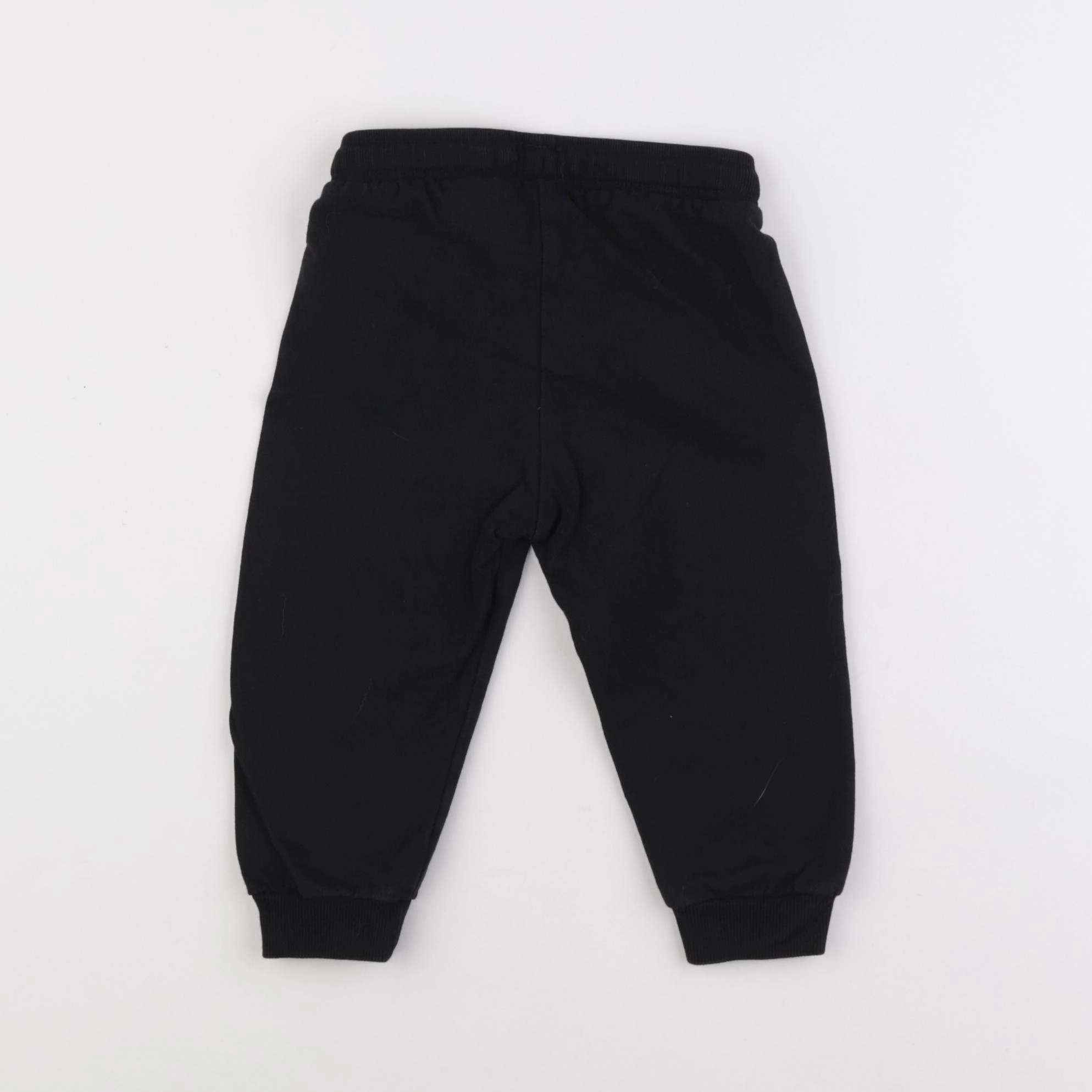 H&M - jogging noir - 12 mois