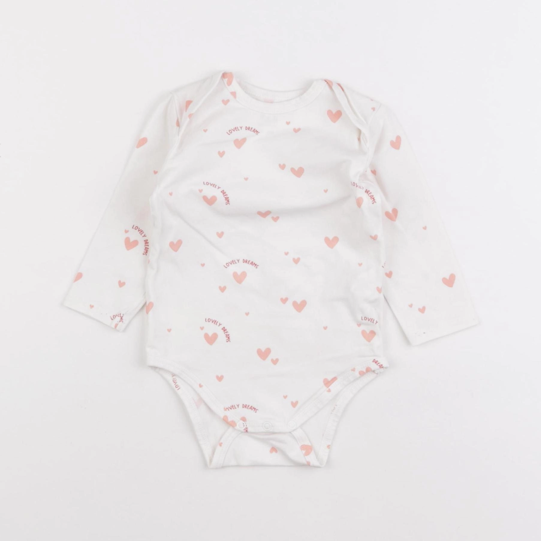 Tape à l'oeil - body rose - 9 mois