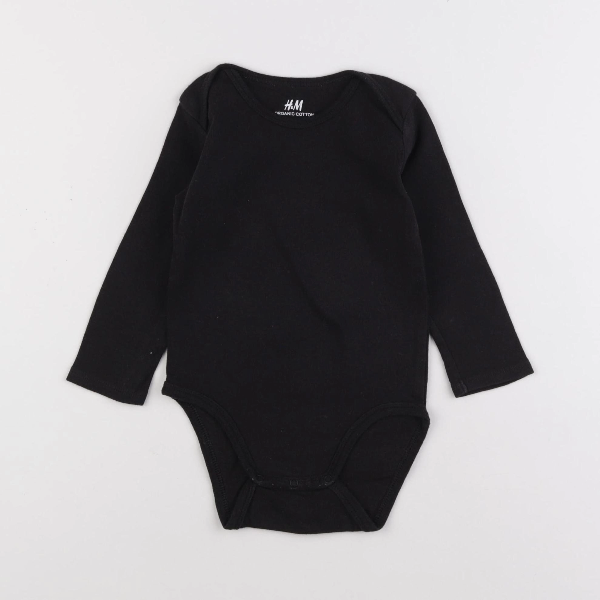 H&M - body noir - 9/12 mois