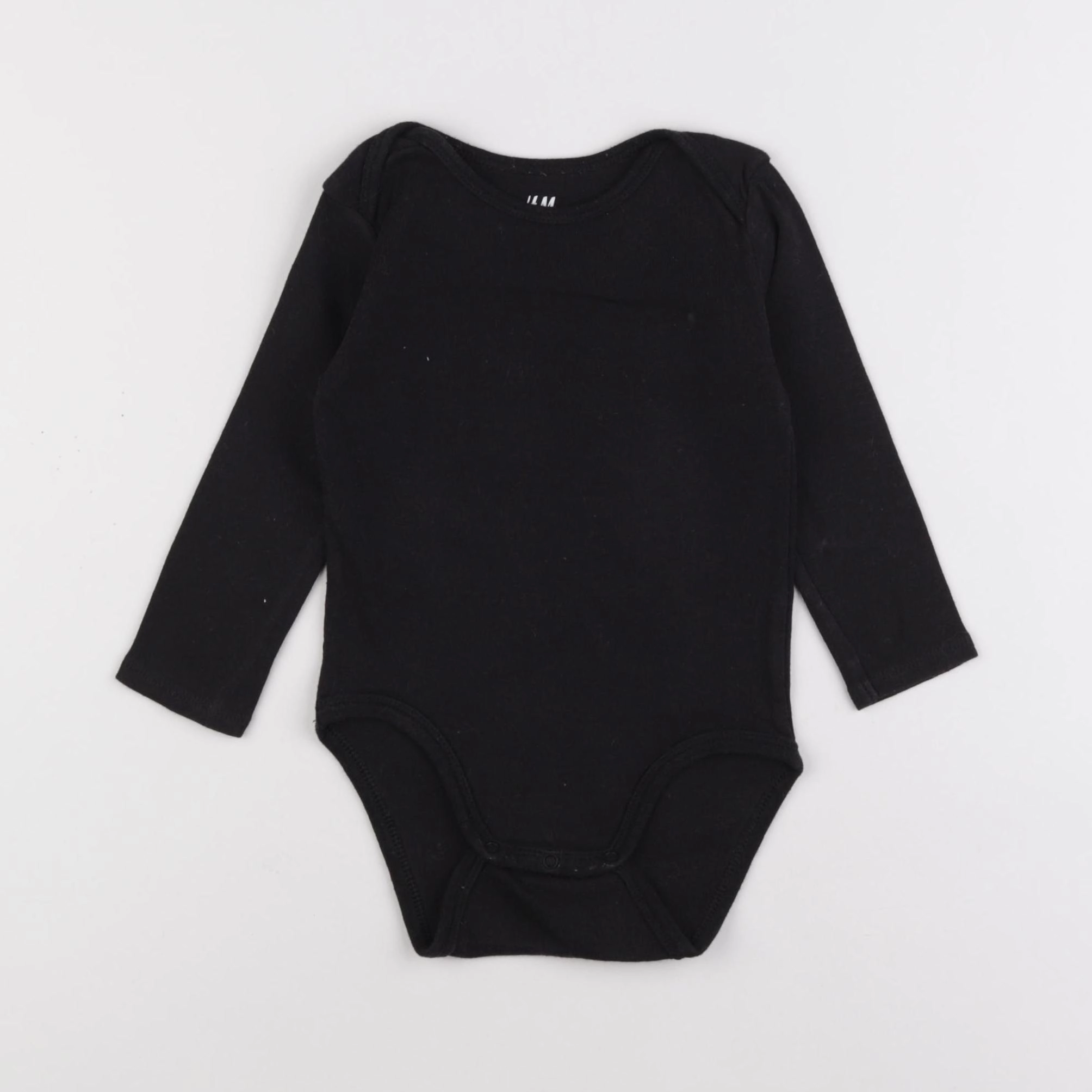 H&M - body noir - 9/12 mois