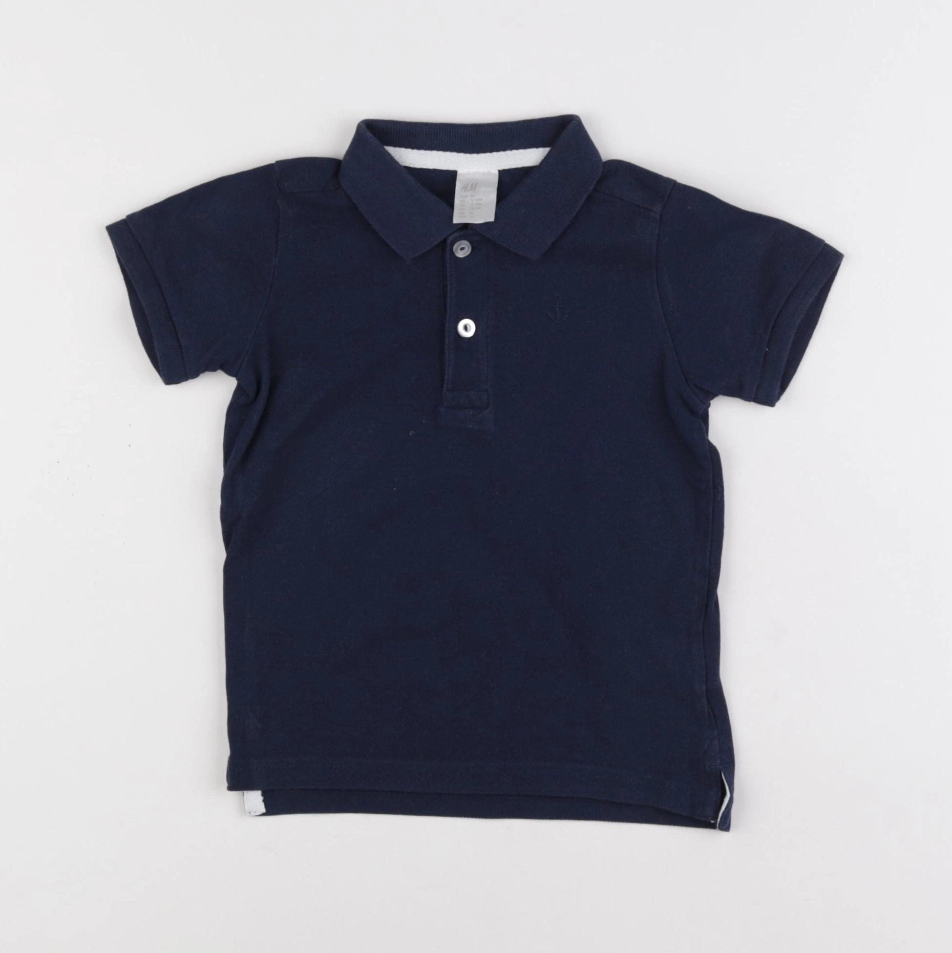 H&M - polo bleu - 12/18 mois