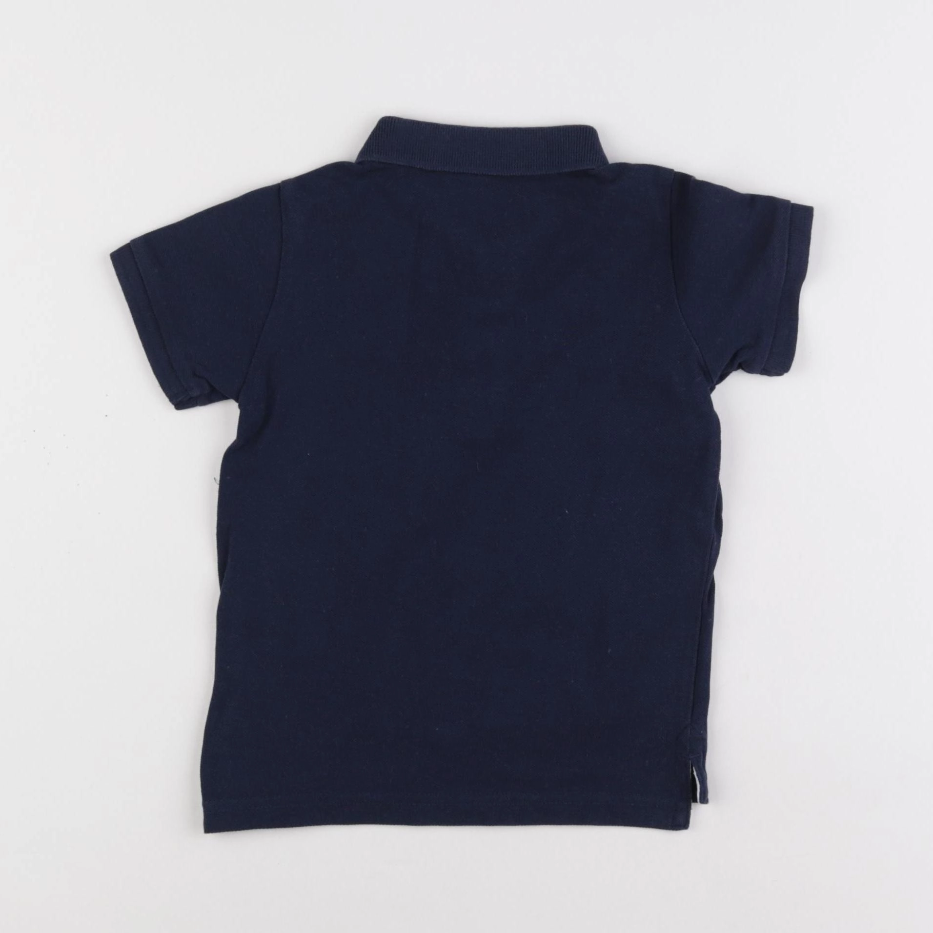 H&M - polo bleu - 12/18 mois