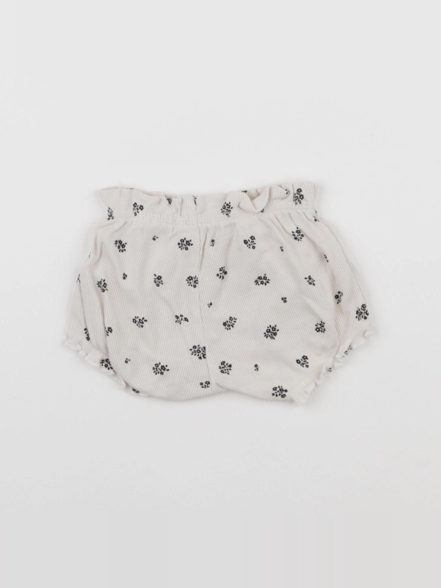 H&M - short beige - 1 mois