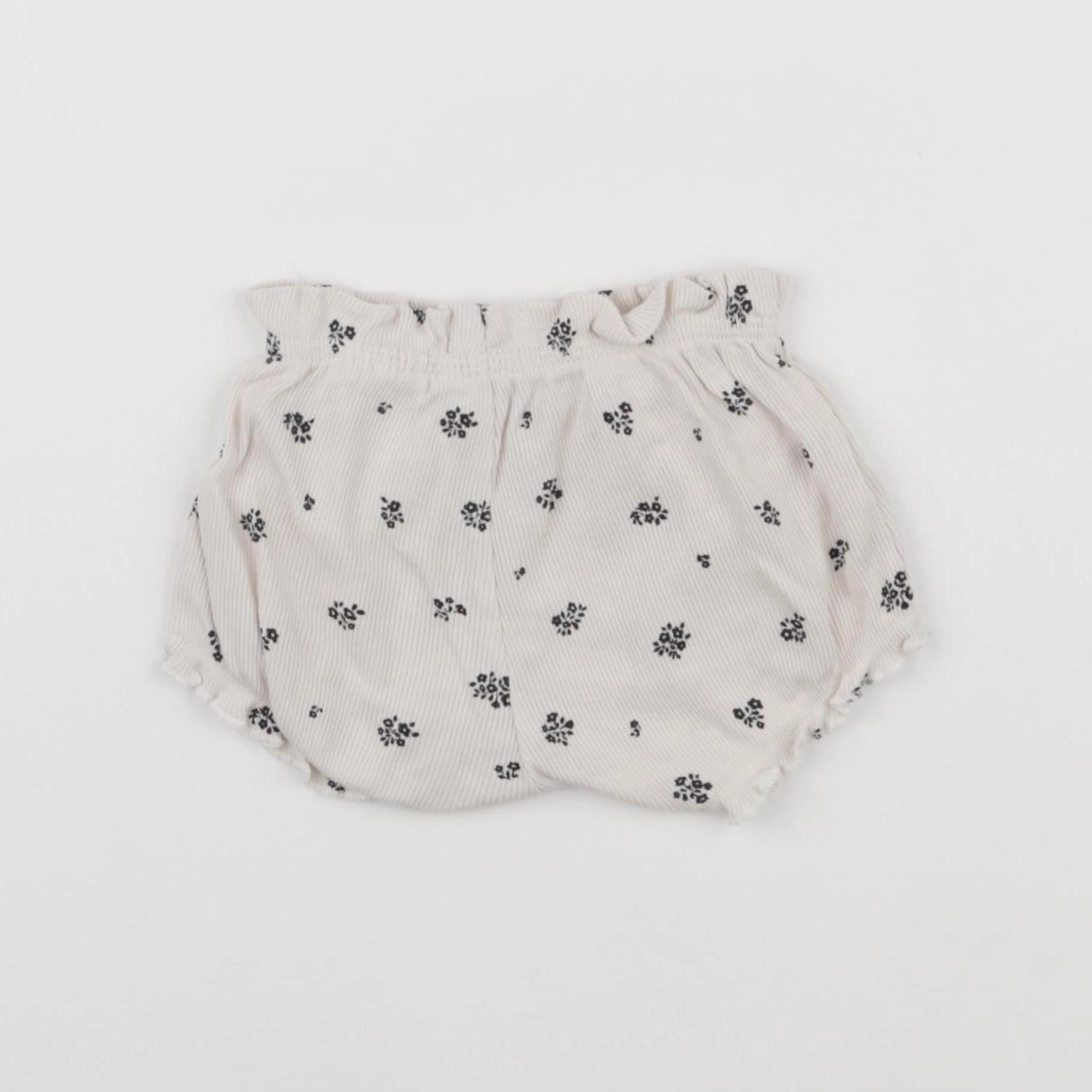 H&M - short beige - 1 mois