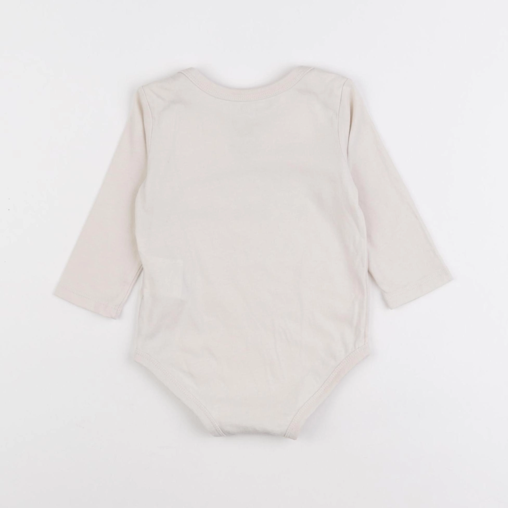 Nike - body beige - 9 mois