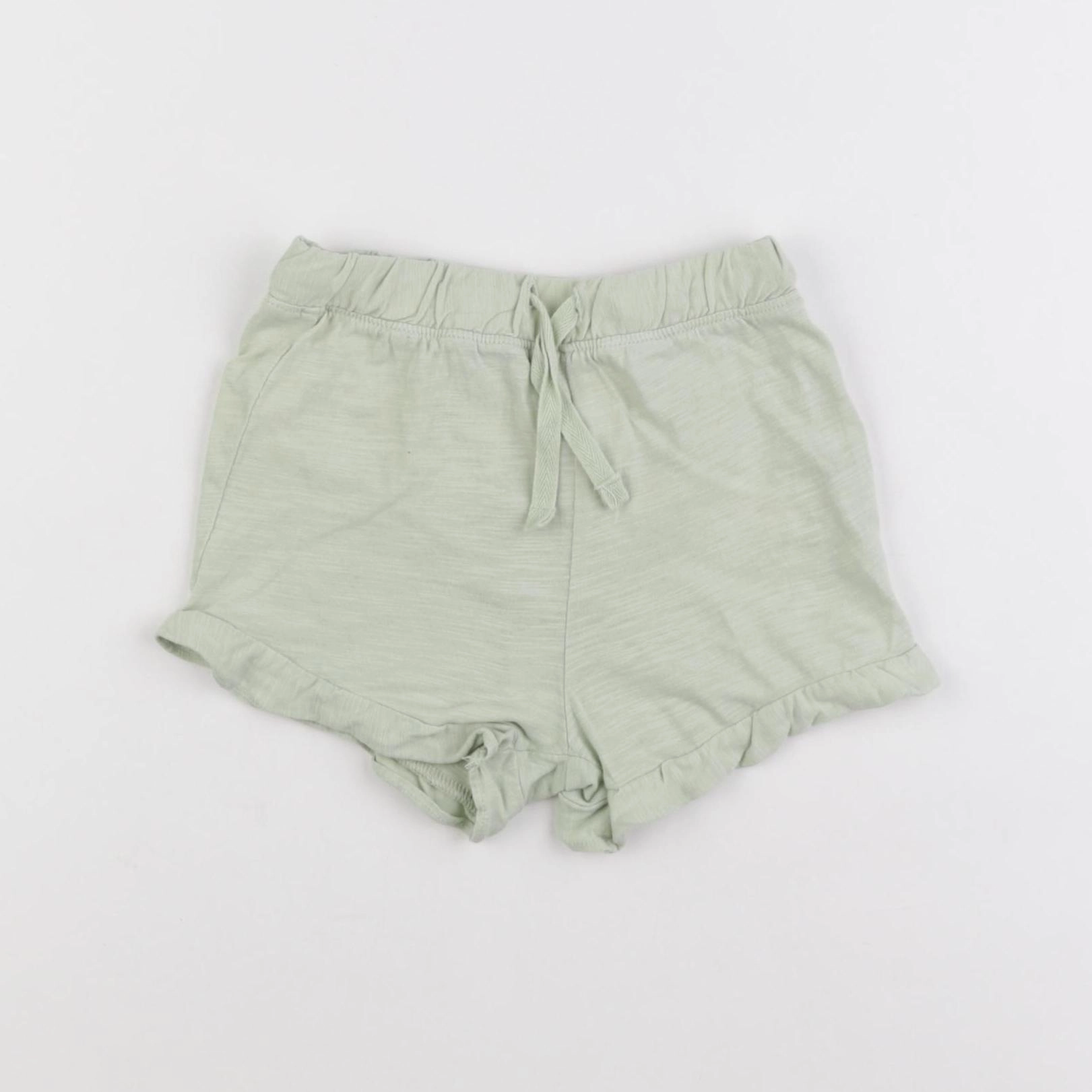 H&M - short vert - 9/12 mois