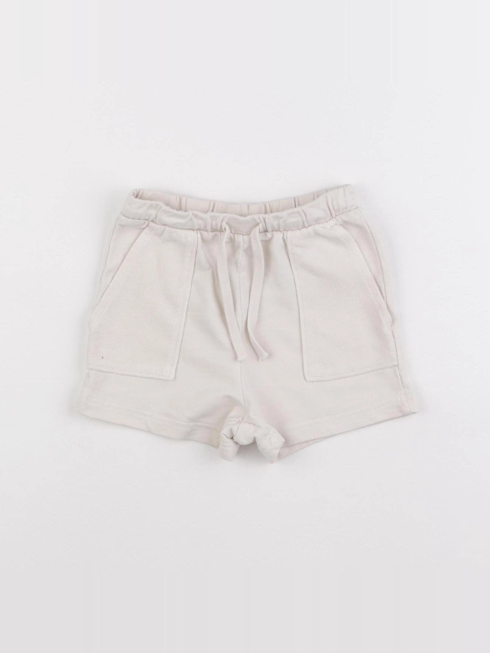 H&M - short beige - 12 mois