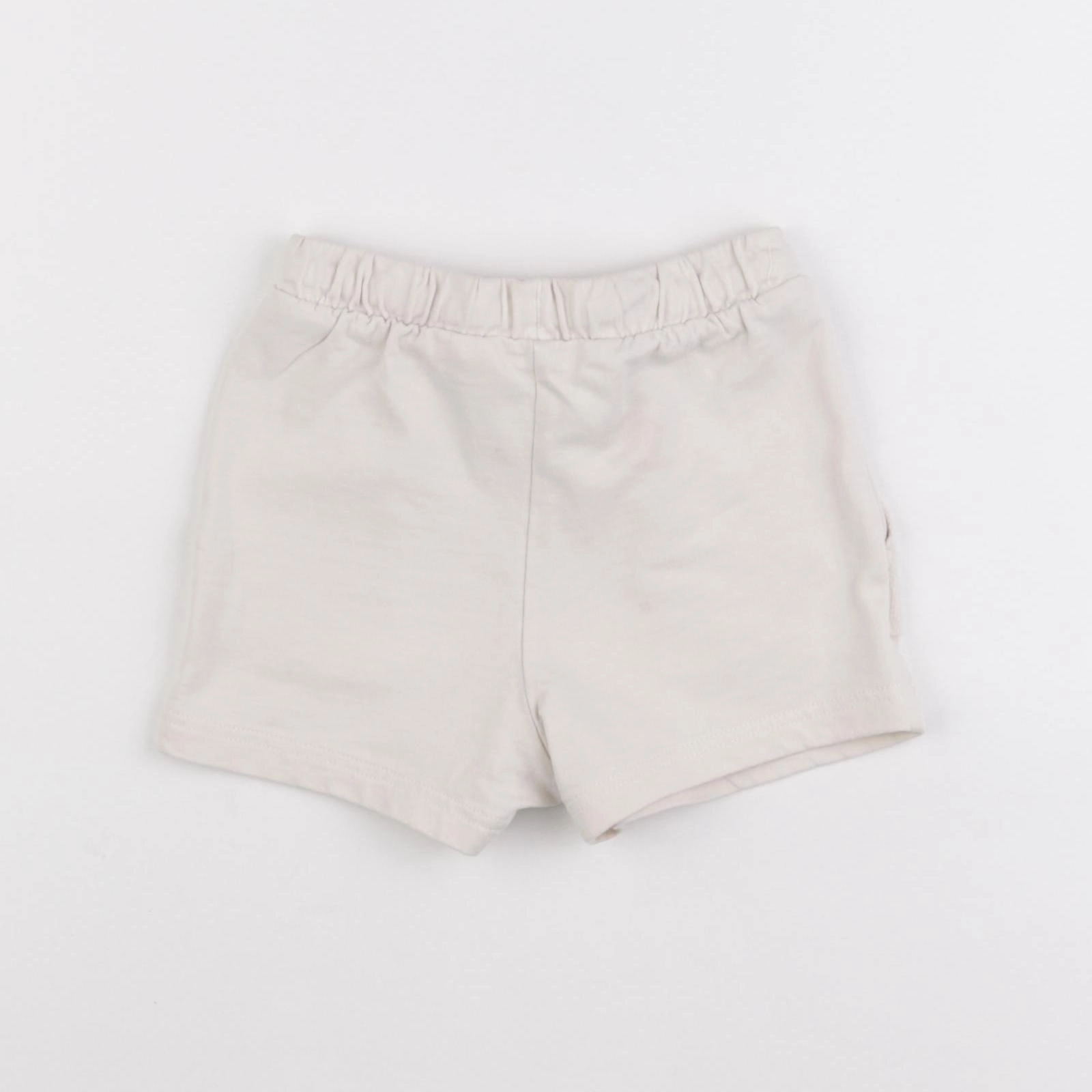 H&M - short beige - 12 mois