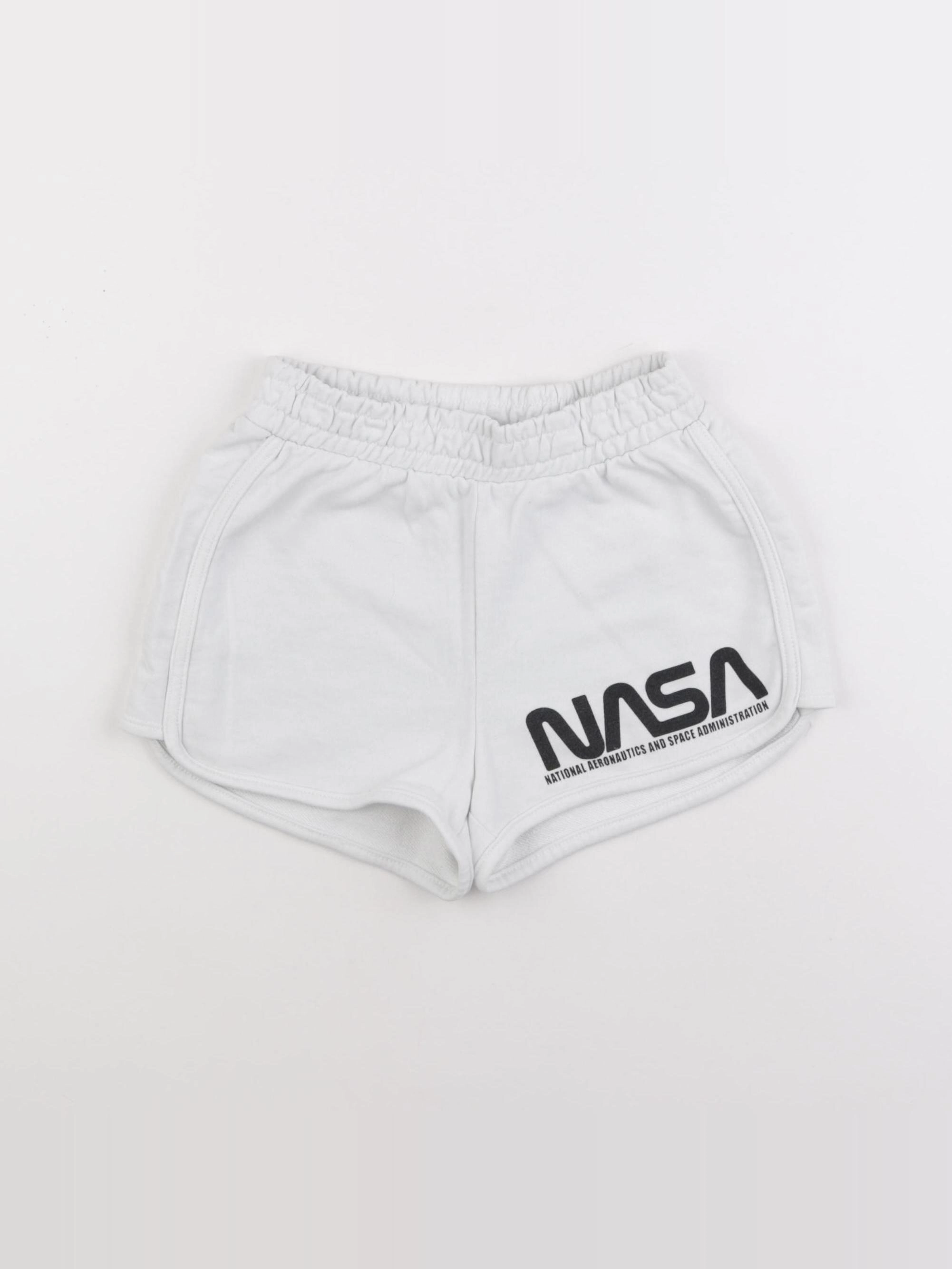 H&M - short blanc - 9/10 ans