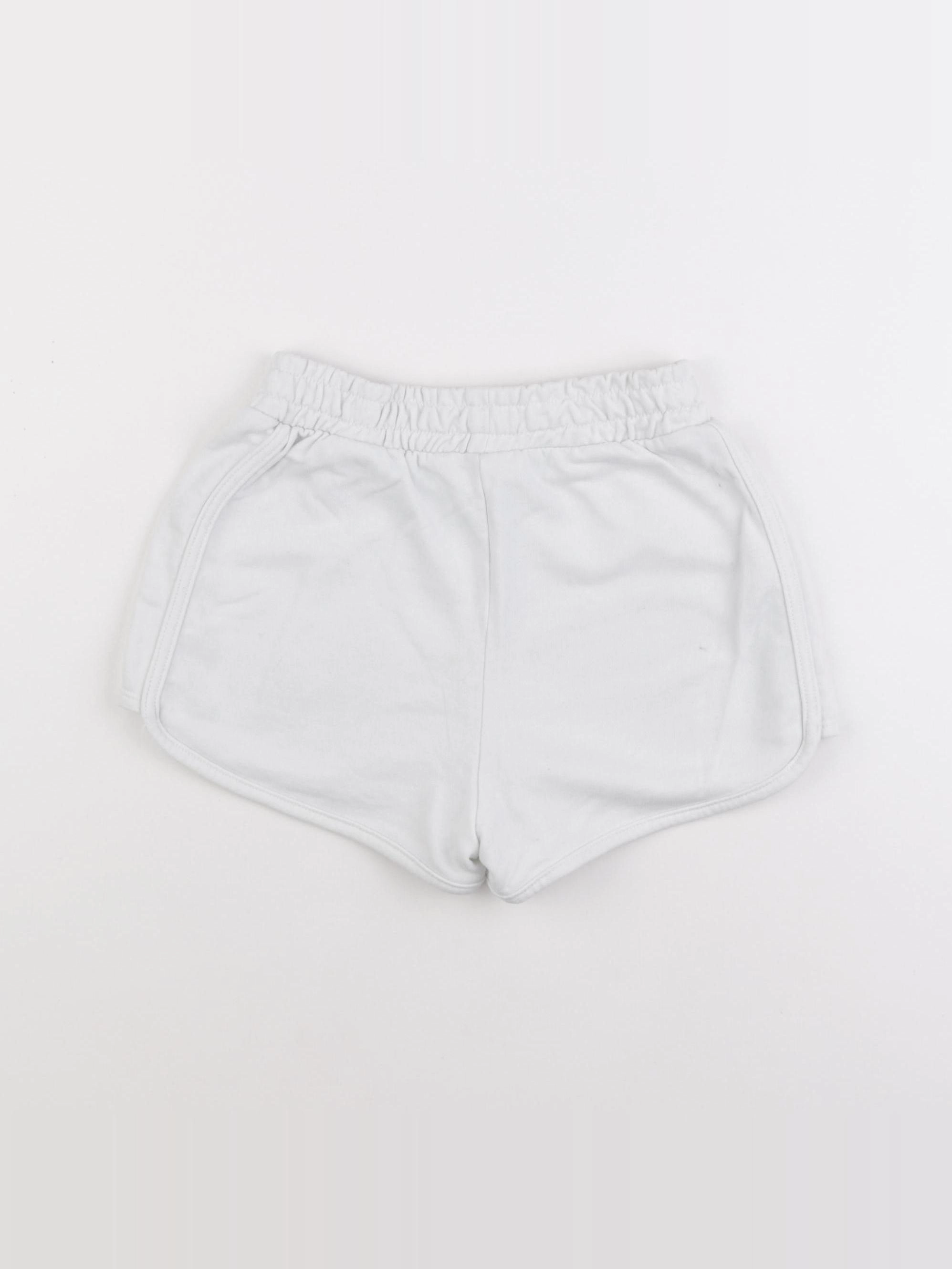 H&M - short blanc - 9/10 ans