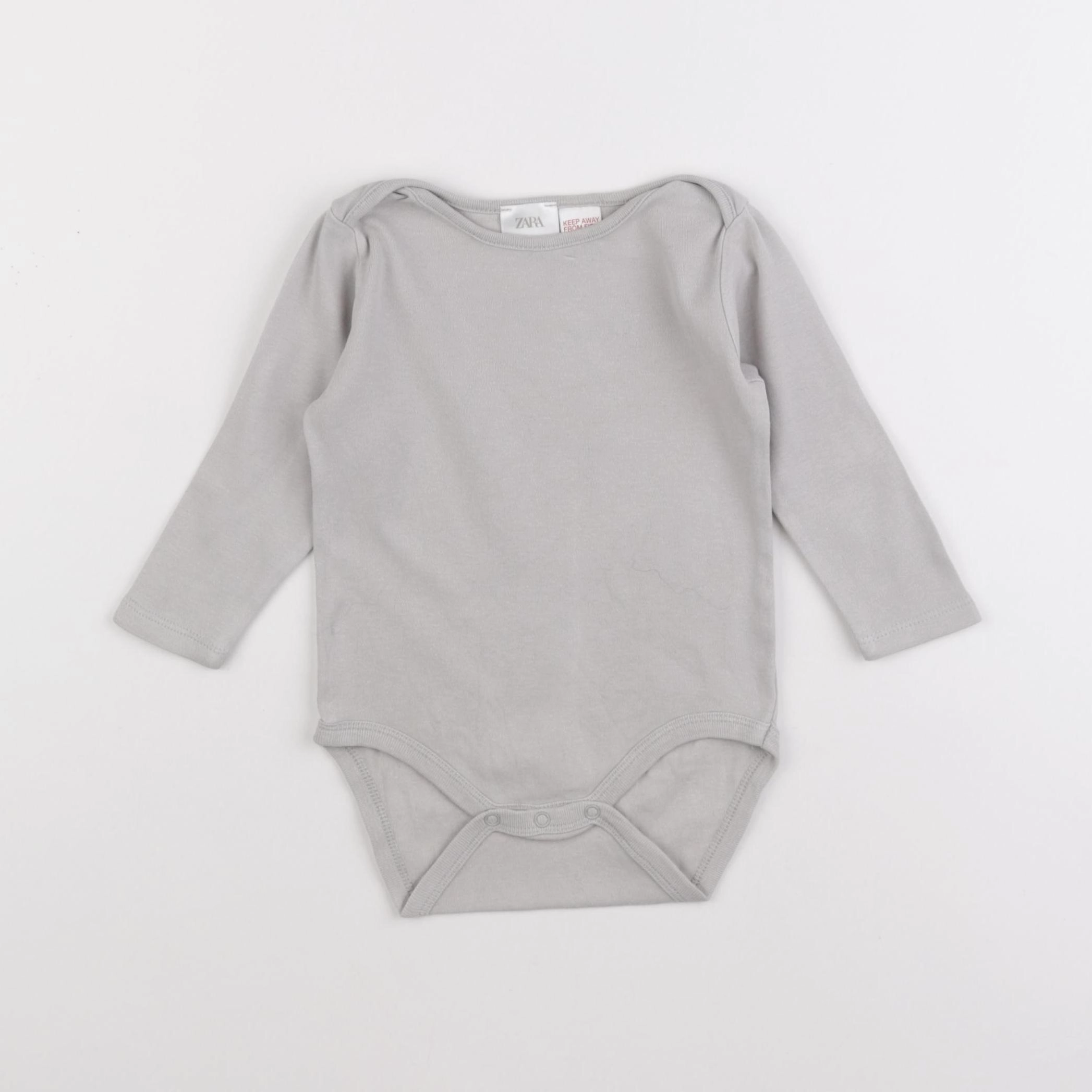 Zara - body gris - 12/18 mois