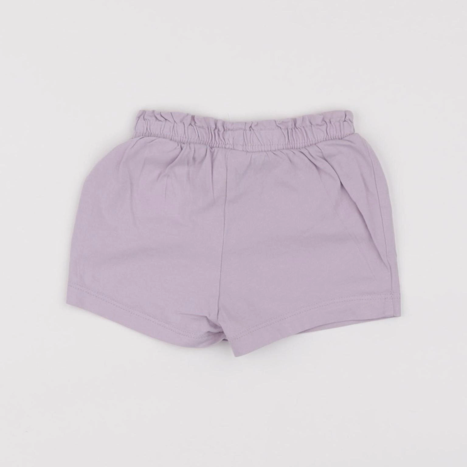 H&M - short violet - 3/6 mois