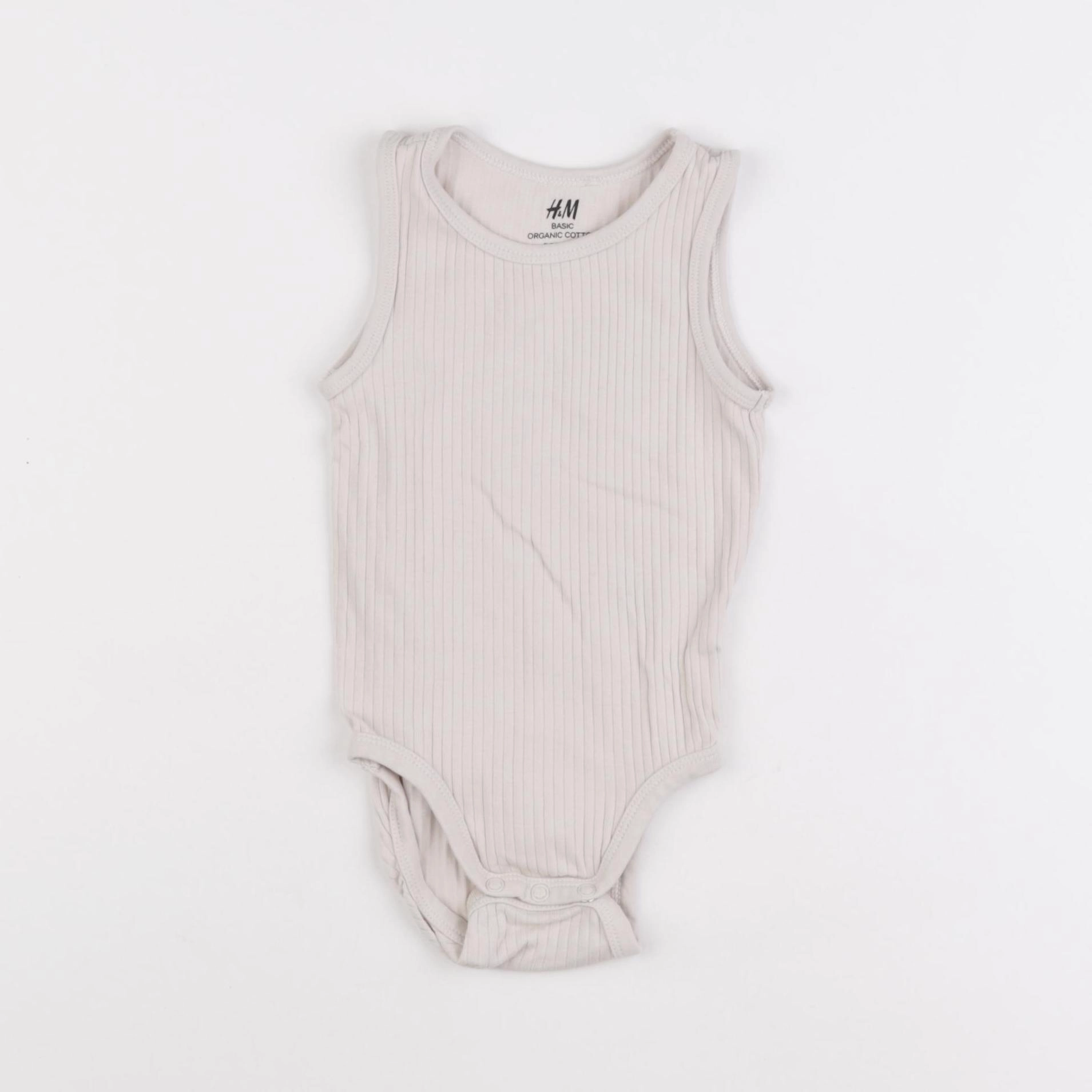 H&M - body beige - 6/9 mois