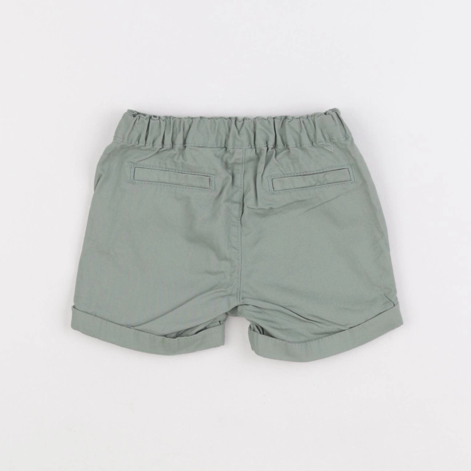 H&M - short vert - 3/6 mois