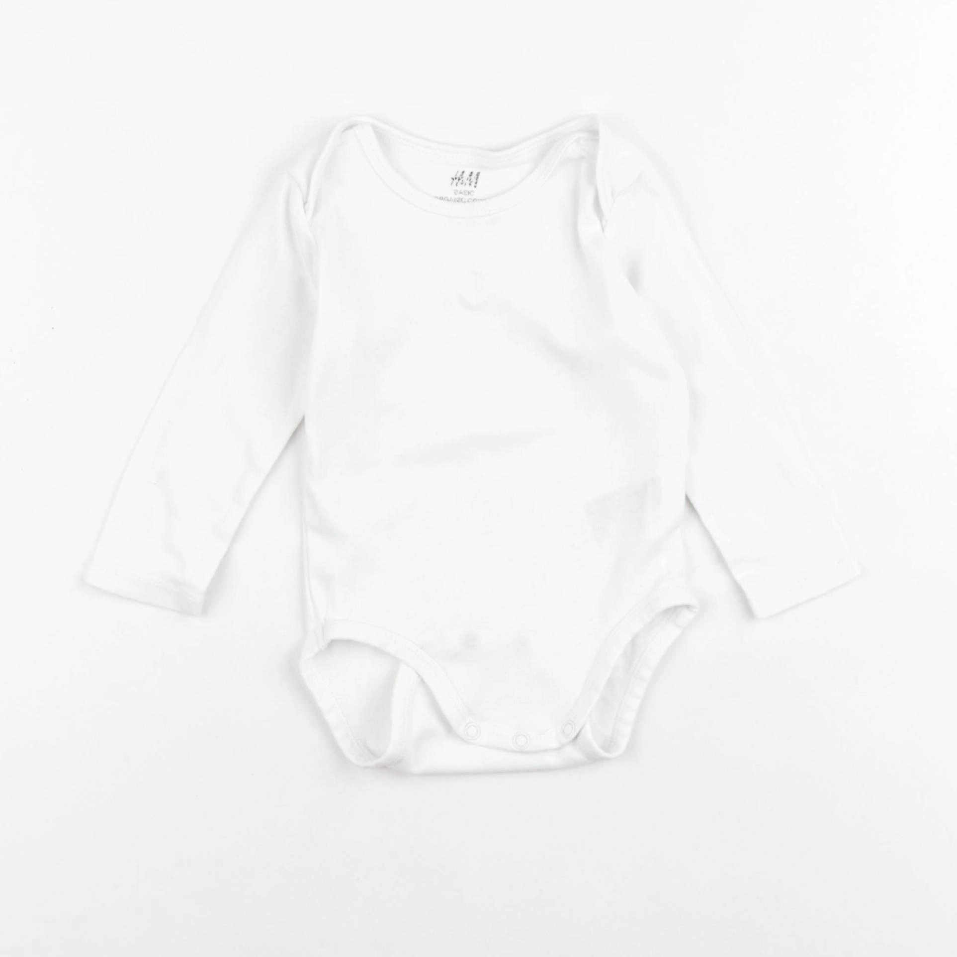 H&M - body blanc - 6/9 mois