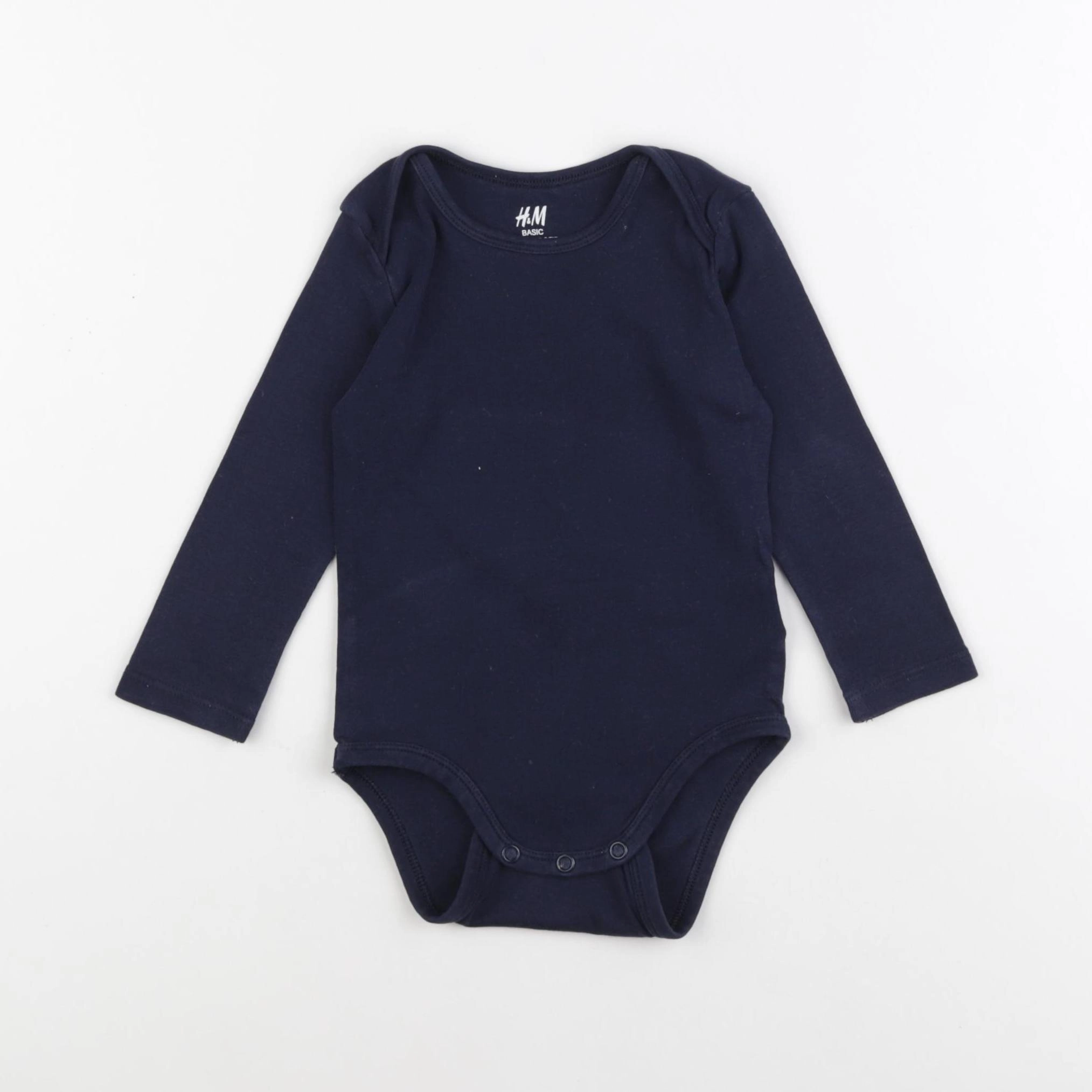H&M - body noir - 6/9 mois