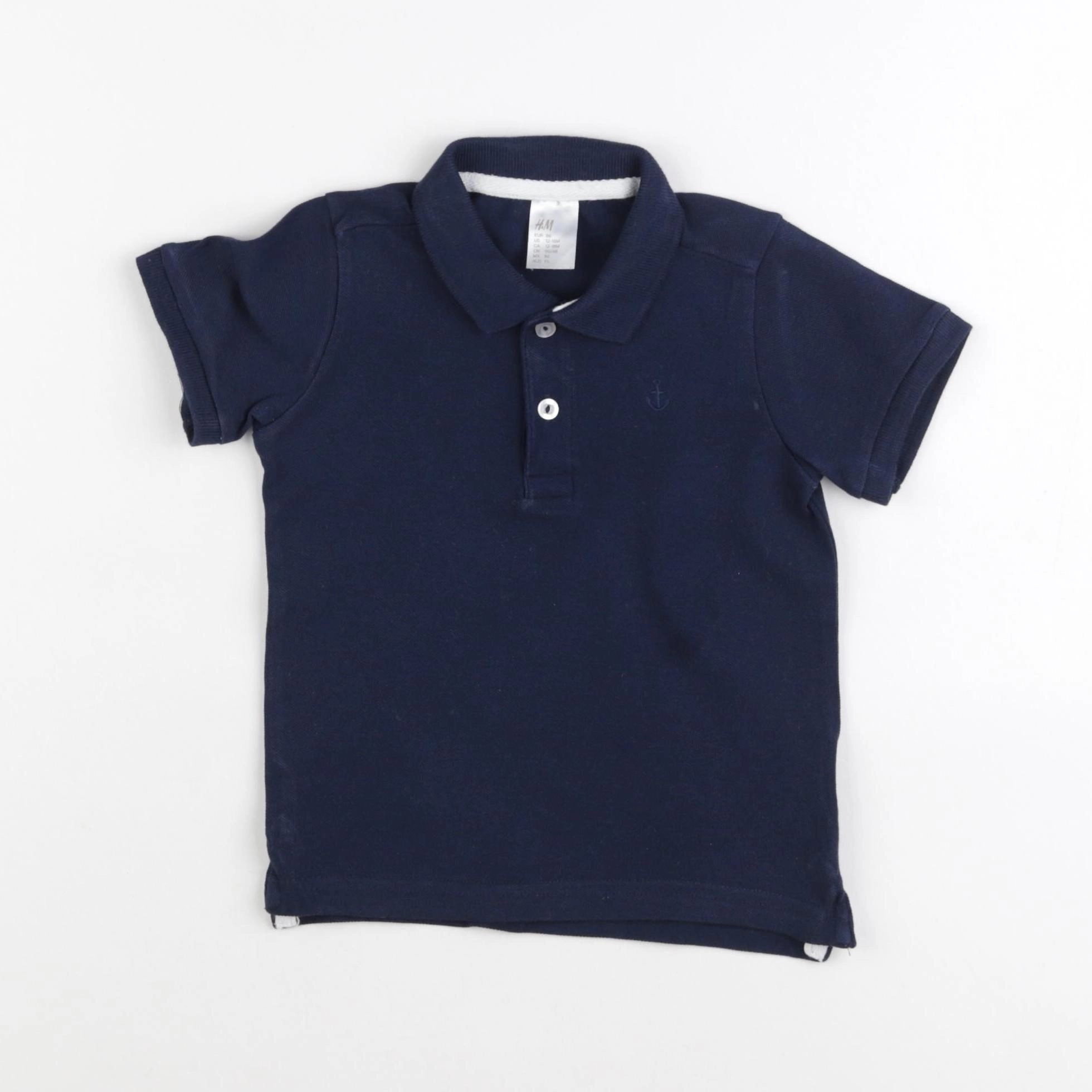 H&M - polo bleu - 12/18 mois