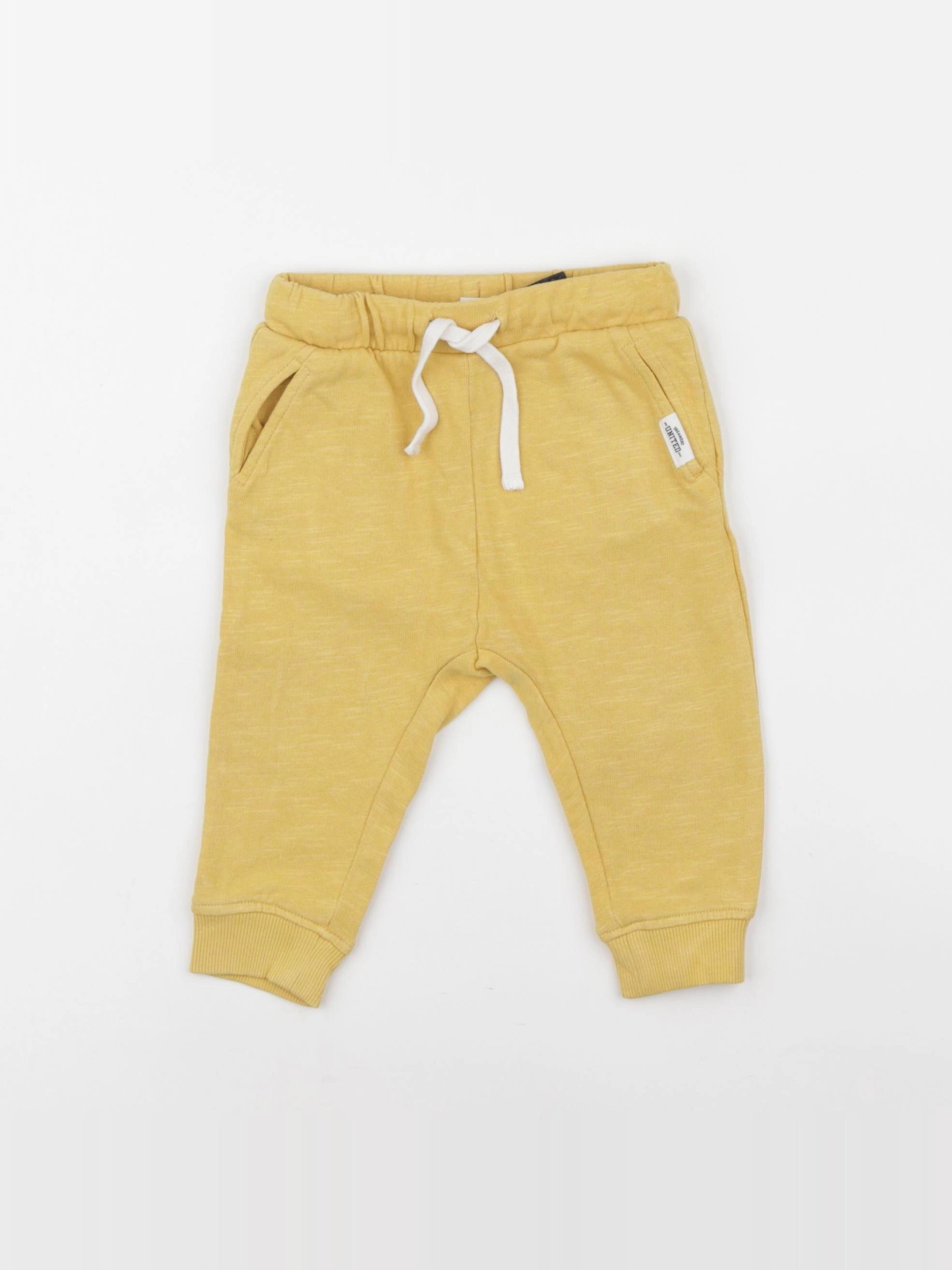 H&M - jogging jaune - 6/9 mois