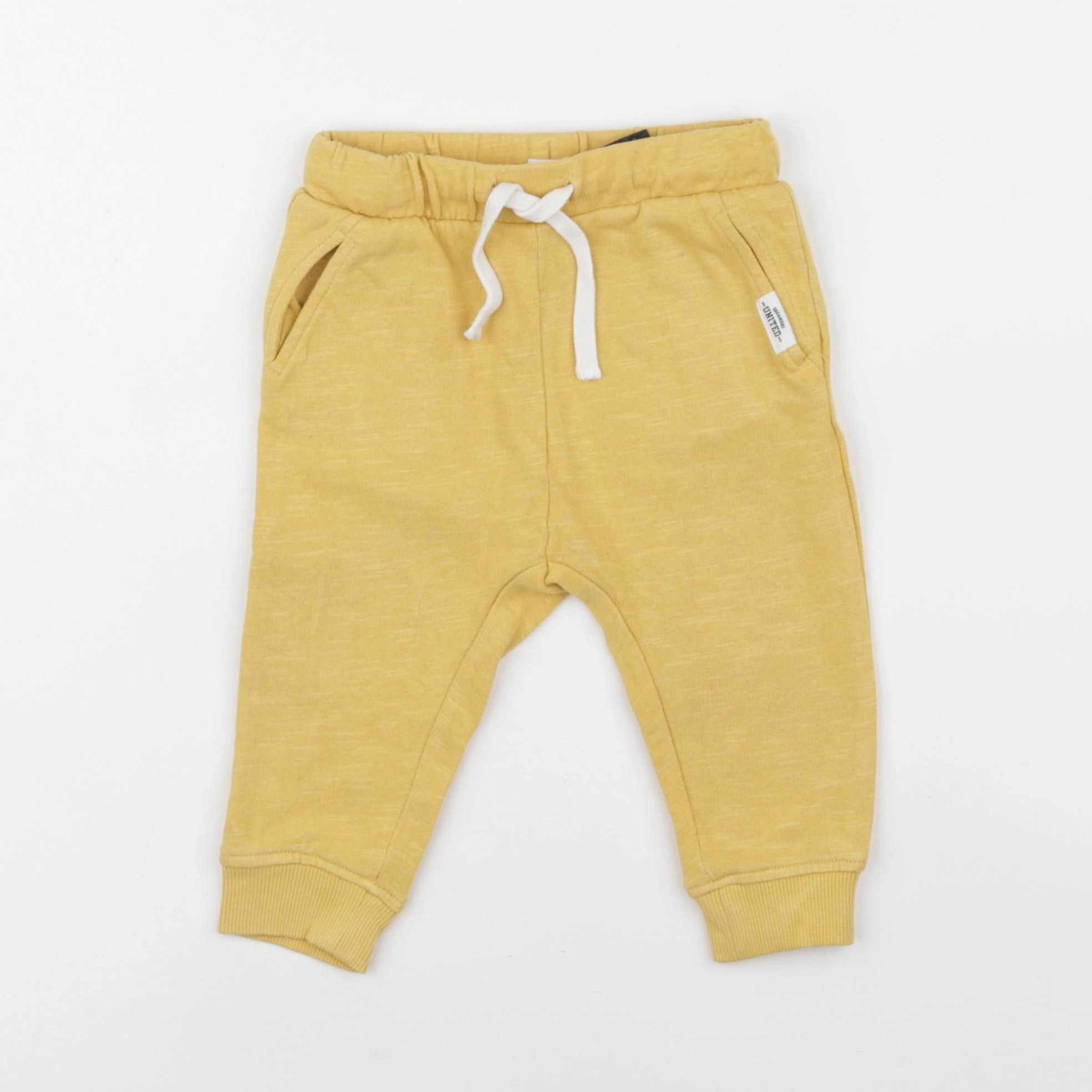 H&M - jogging jaune - 6/9 mois