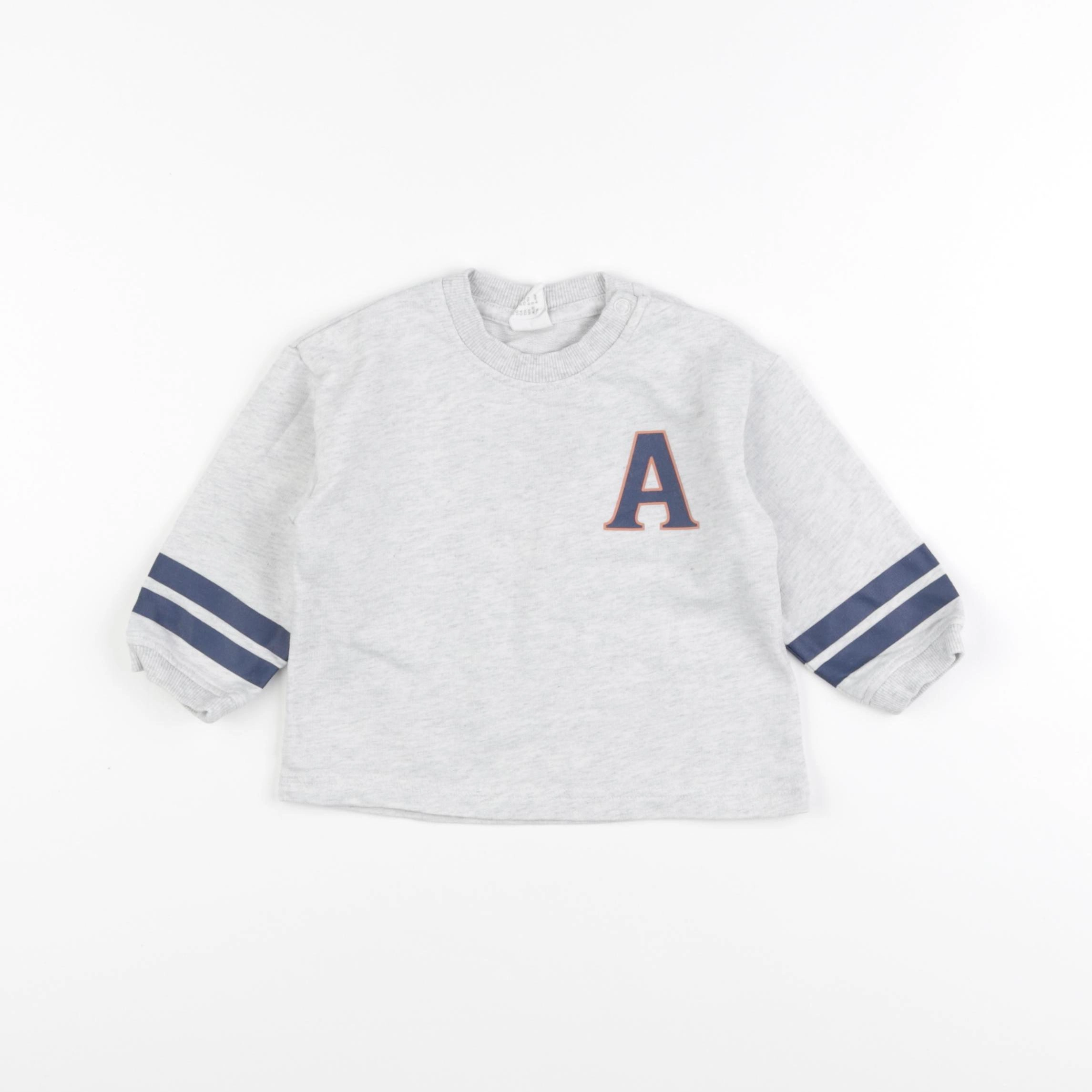 H&M - sweat gris - 6 mois