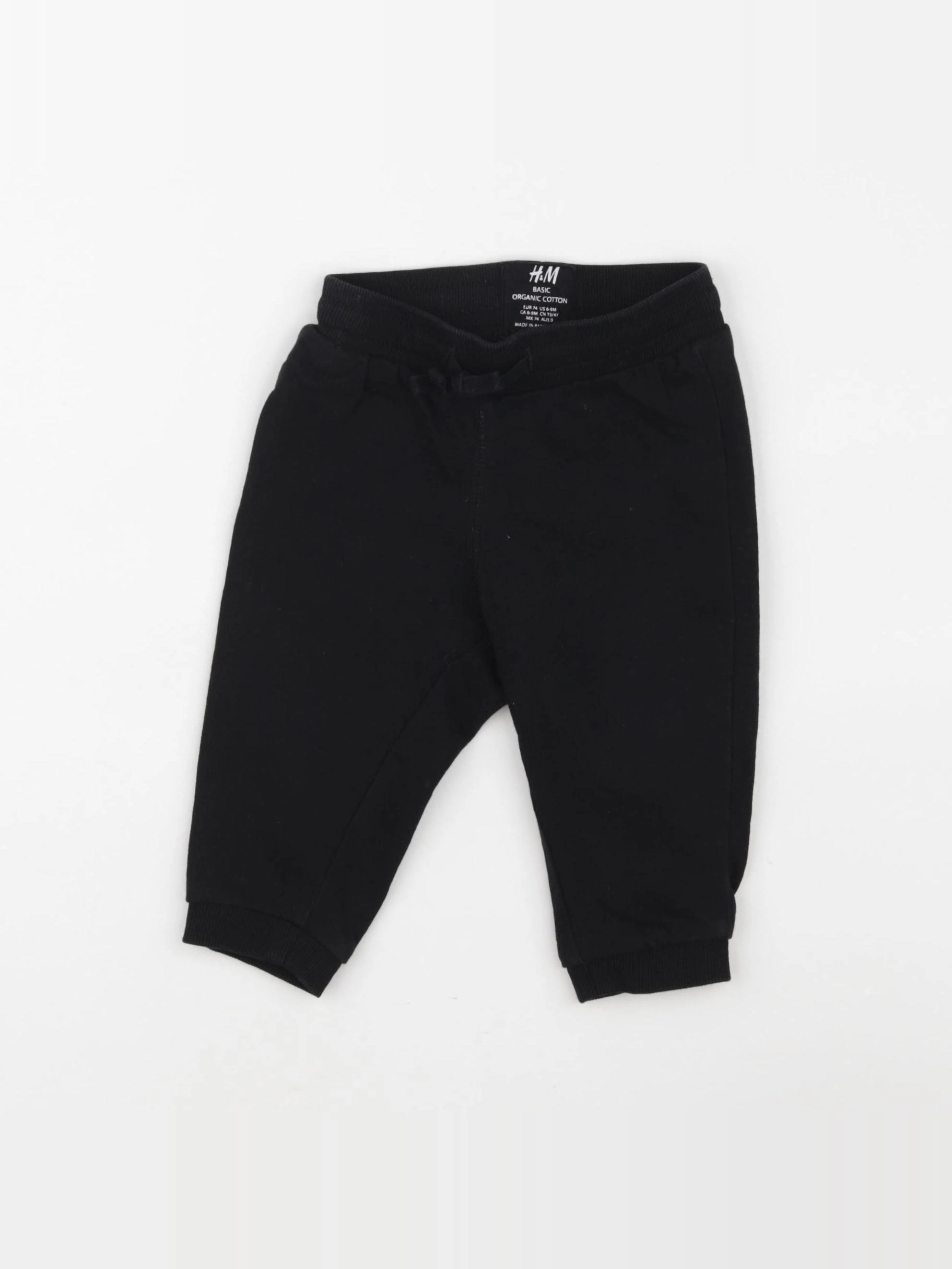 H&M - jogging noir - 6/9 mois