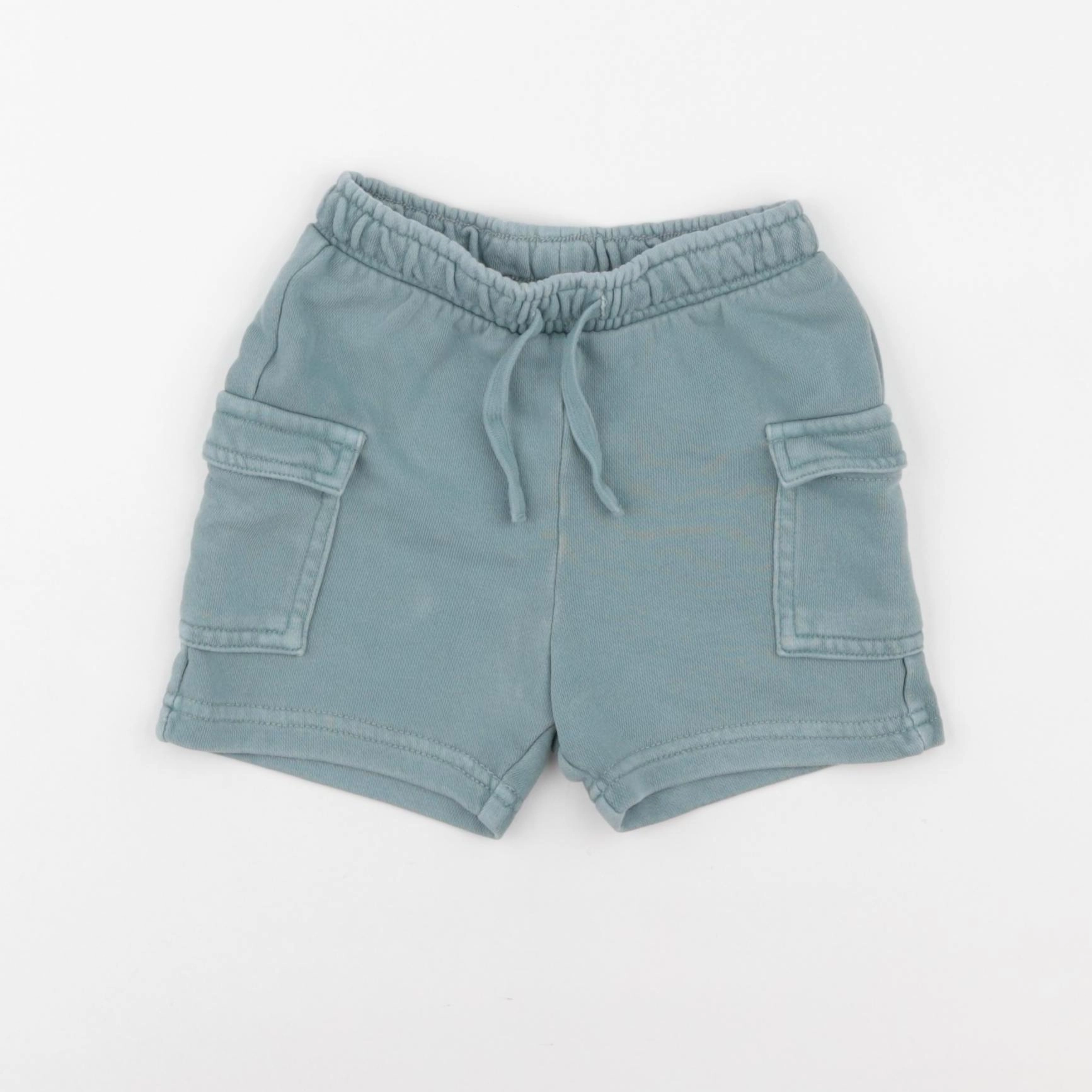 H&M - short vert - 6/9 mois