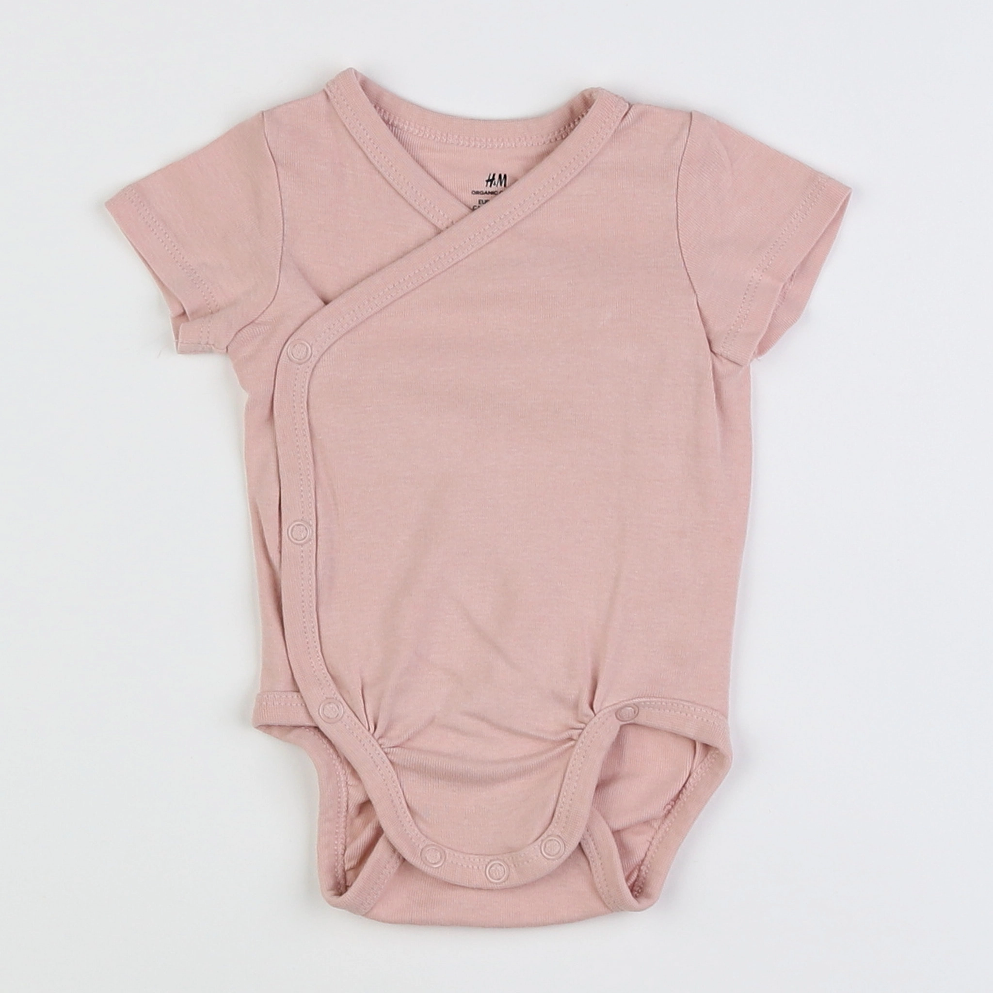 H&M - body rose - 3 mois