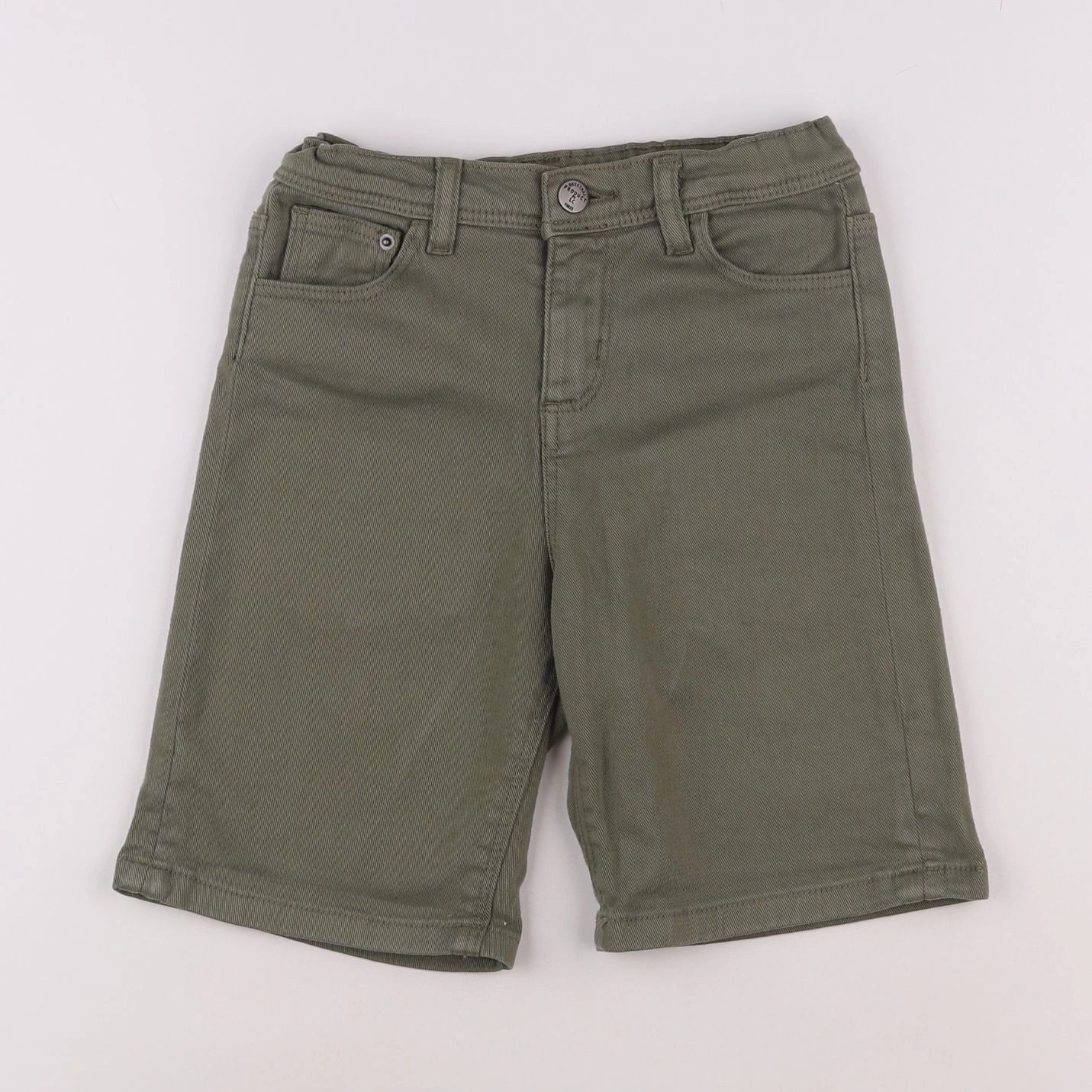 Little Cigogne - short vert - 10 ans