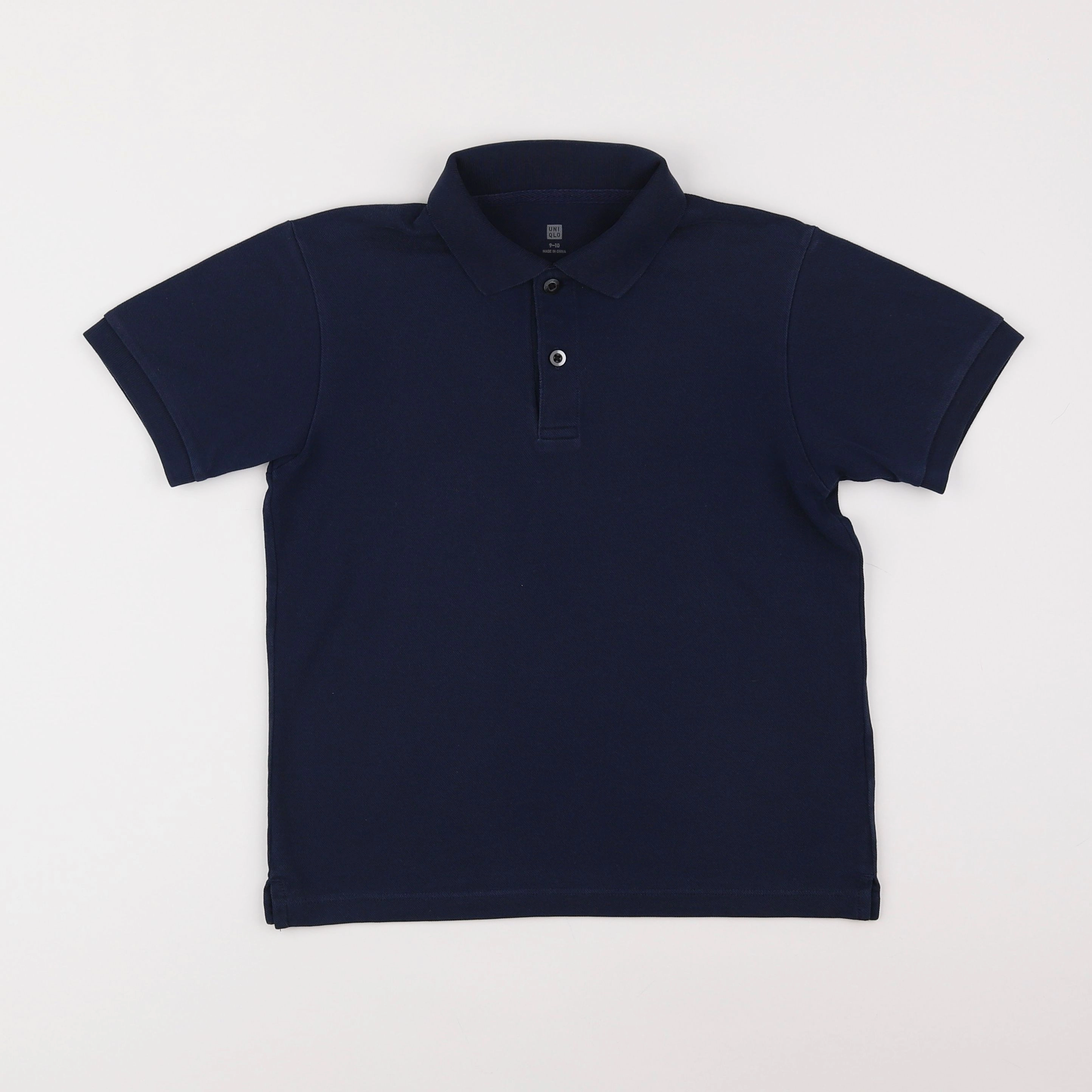 Uniqlo - polo bleu - 9/10 ans