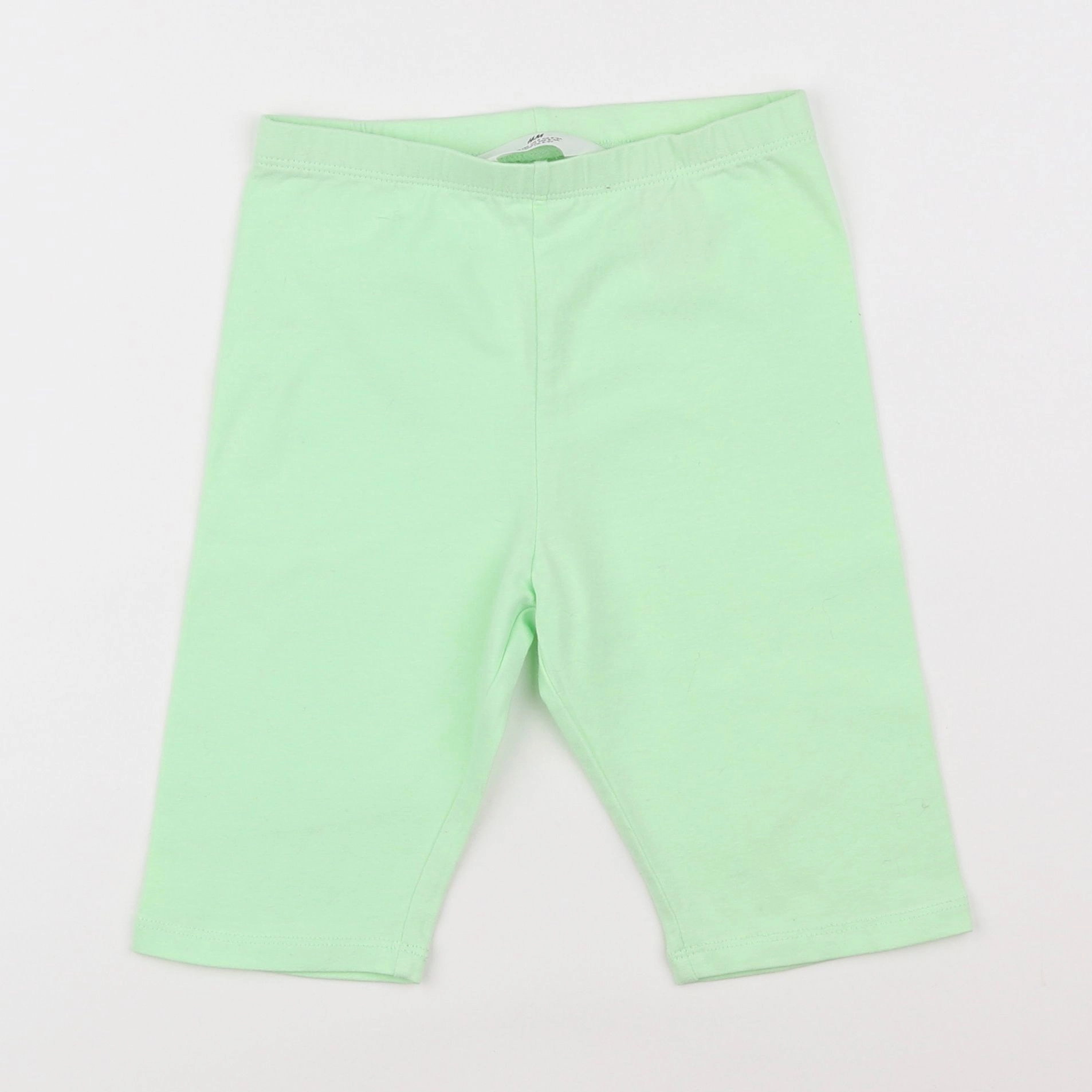 H&M - legging court vert - 8/9 ans