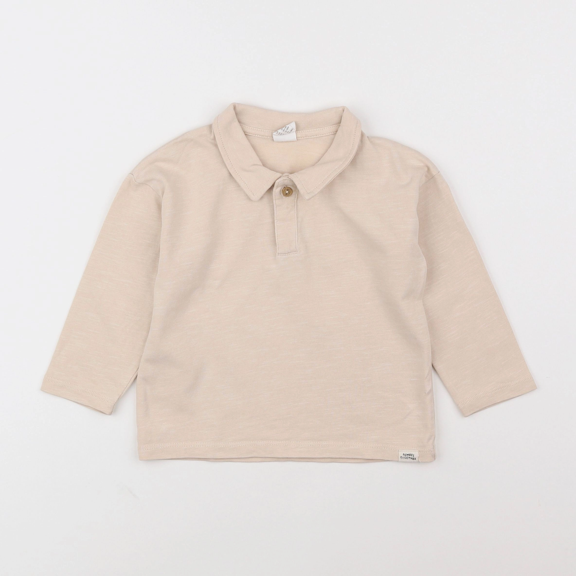 H&M - polo beige - 12/18 mois