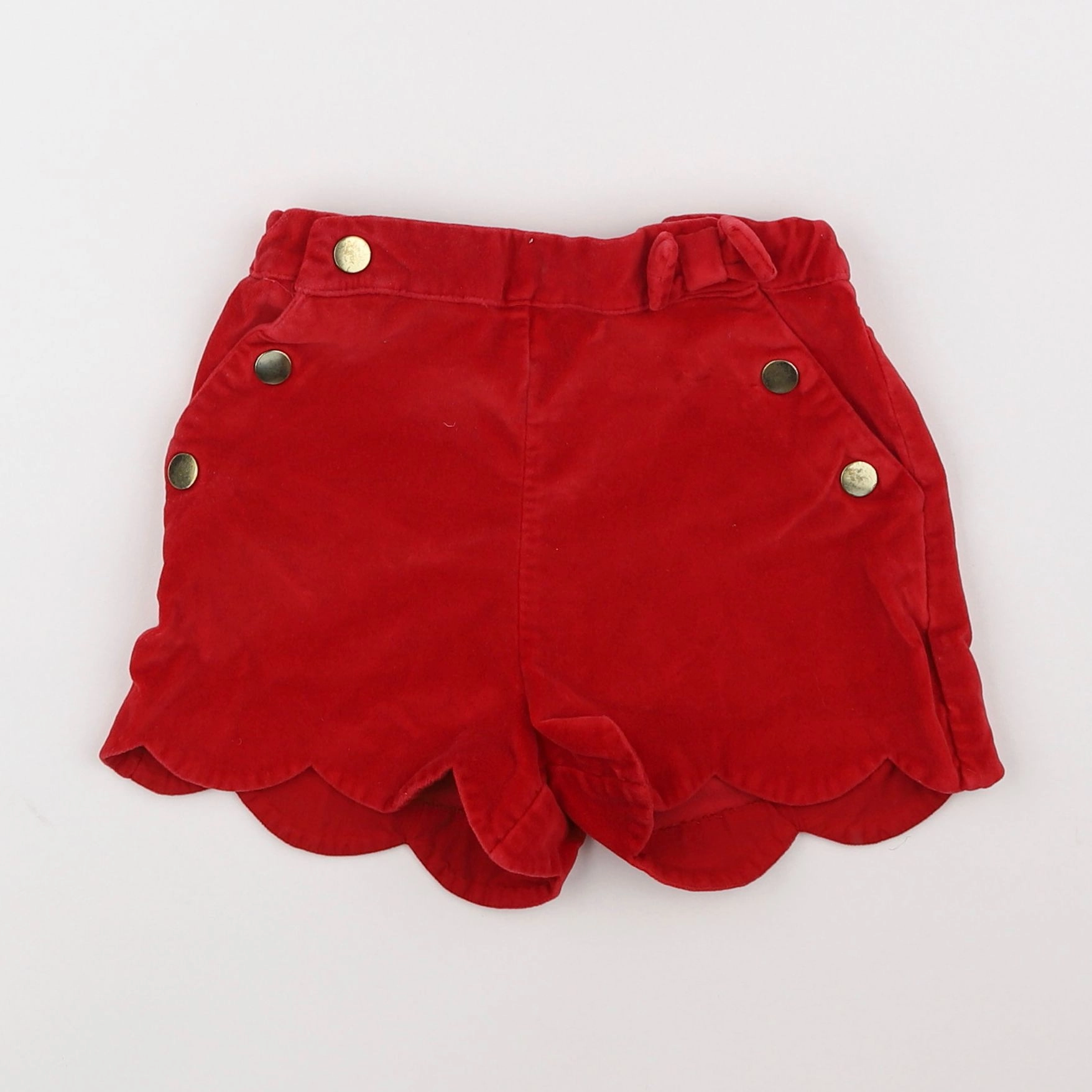 Vertbaudet - short rouge - 7 ans