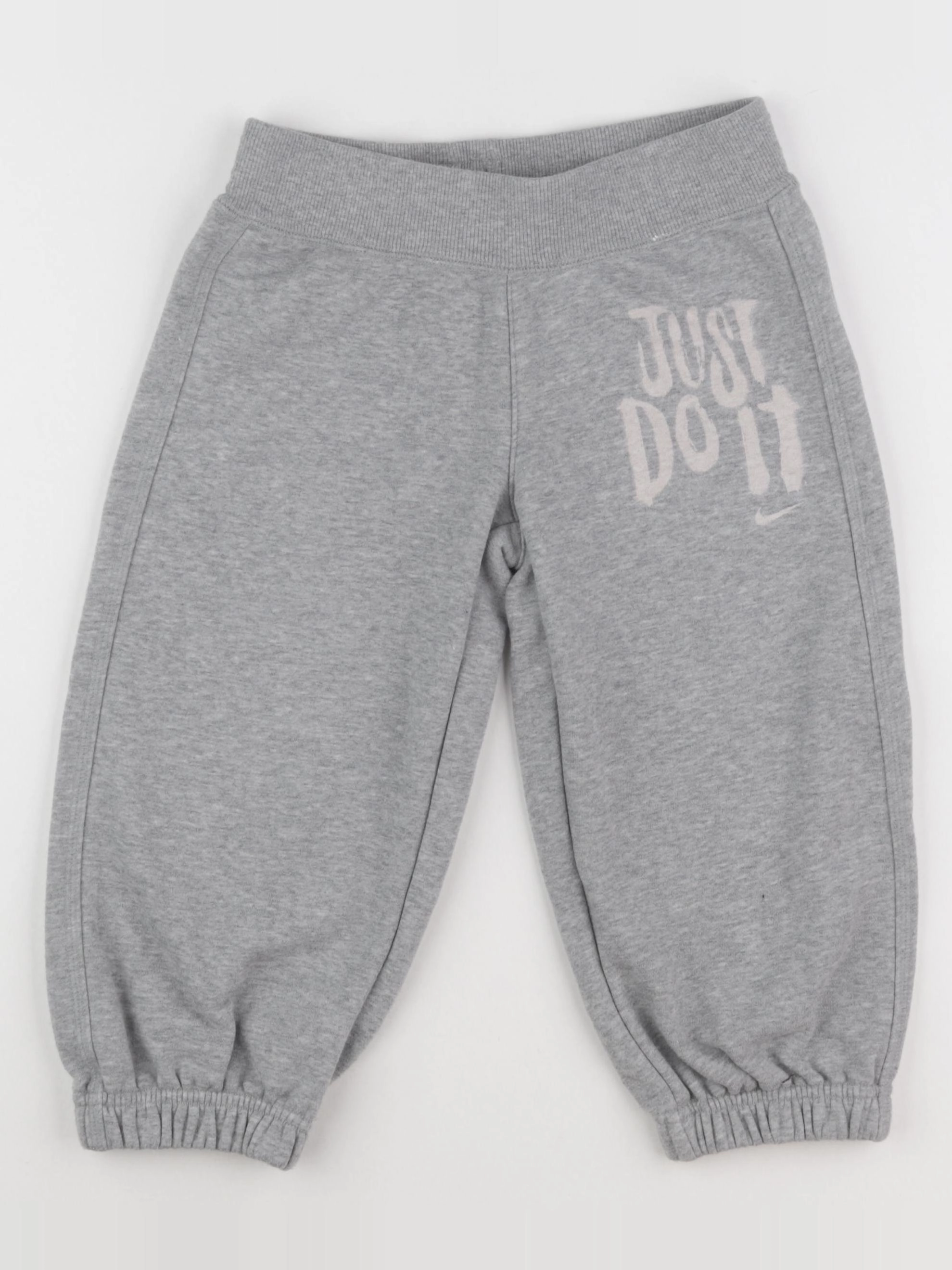 Nike - jogging gris - 8/10 ans