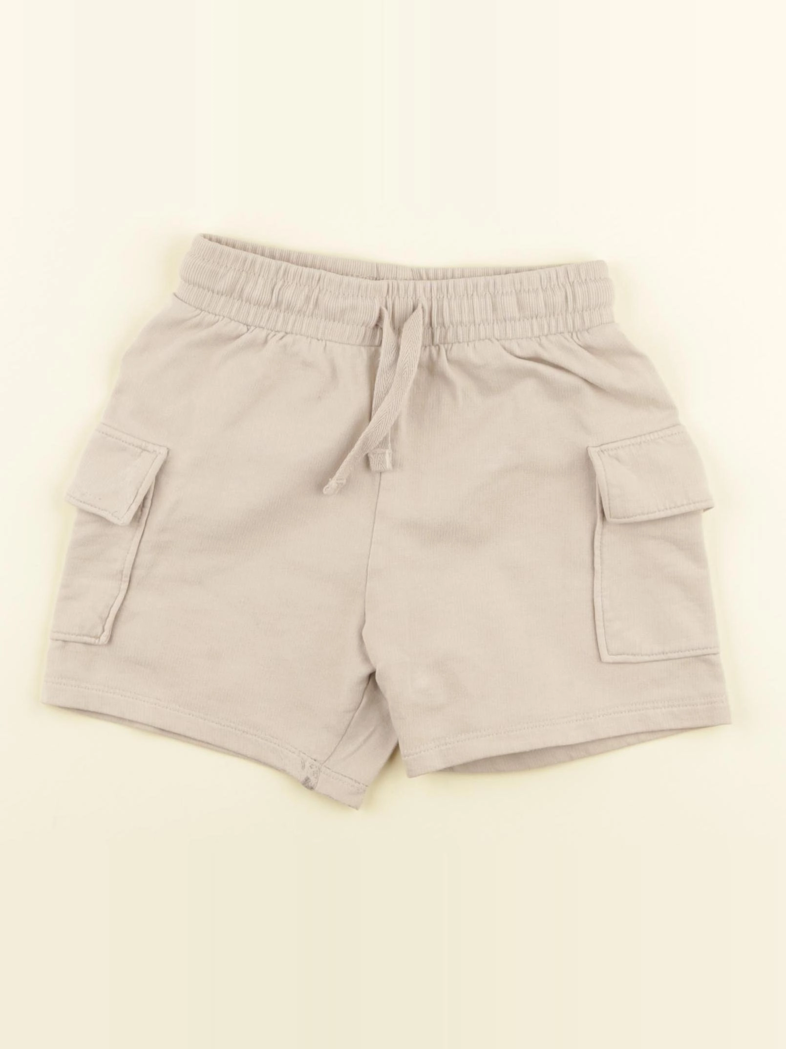 H&M - short beige - 2/3 ans