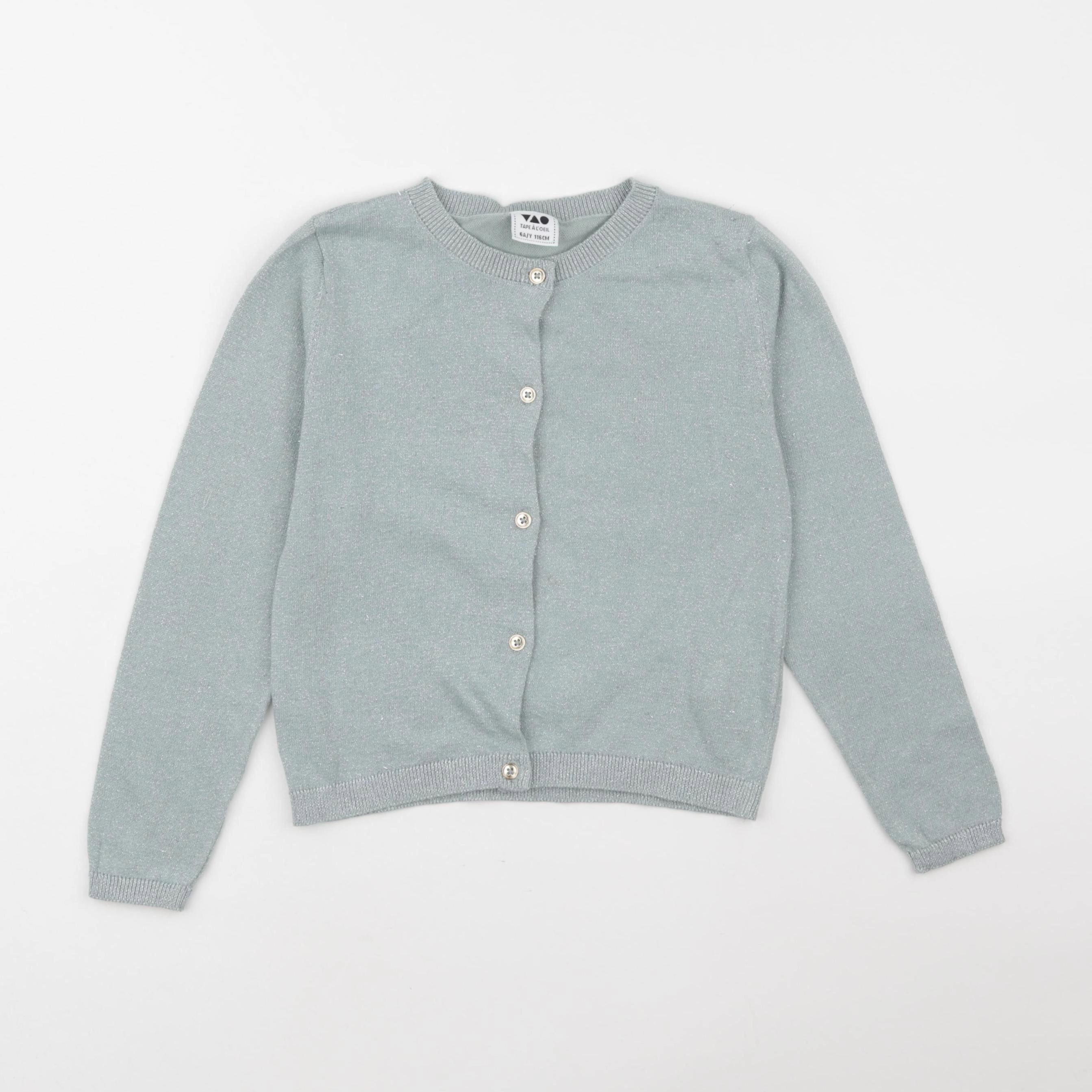 Tape à l'oeil - gilet vert - 6 ans