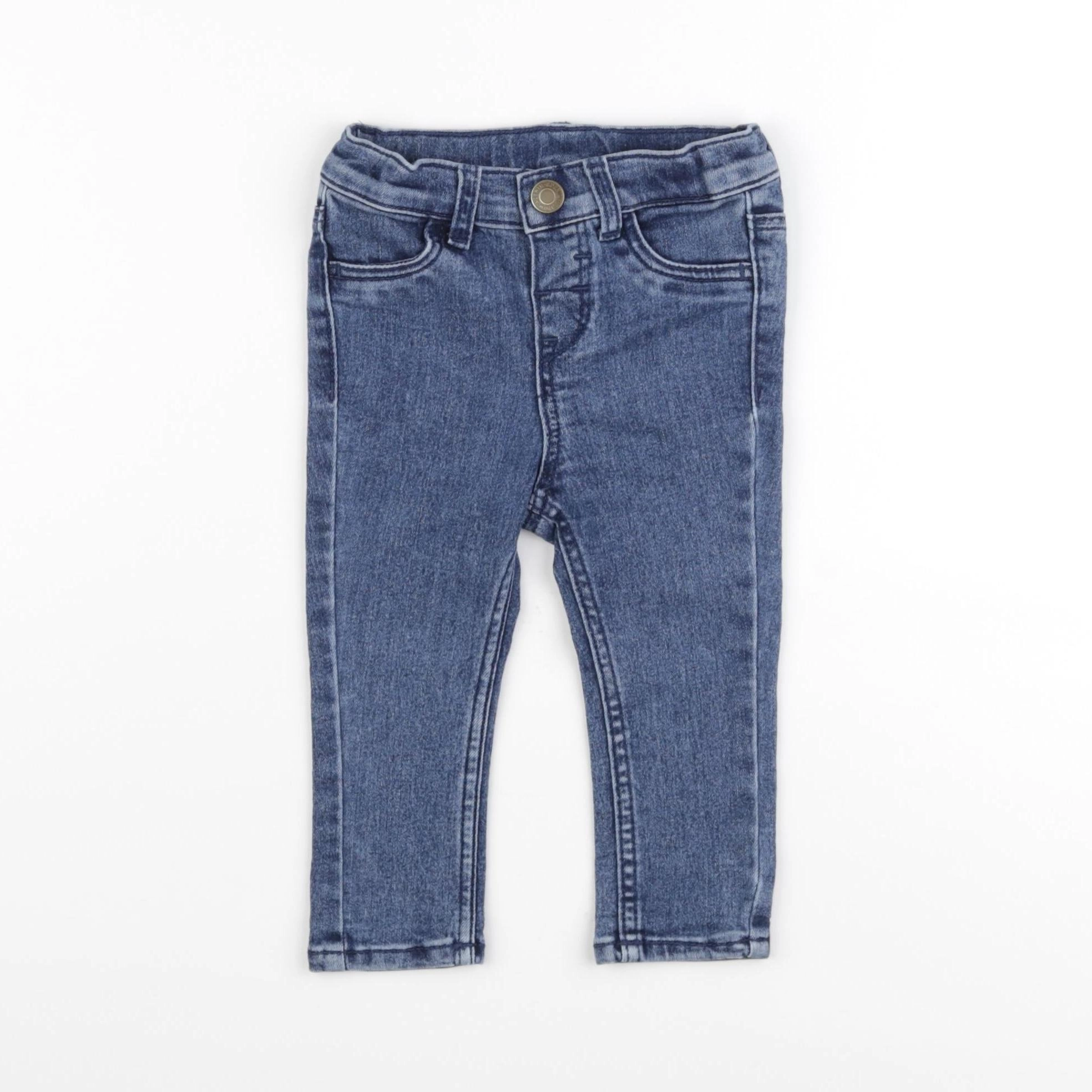 H&M - jean bleu - 6/9 mois