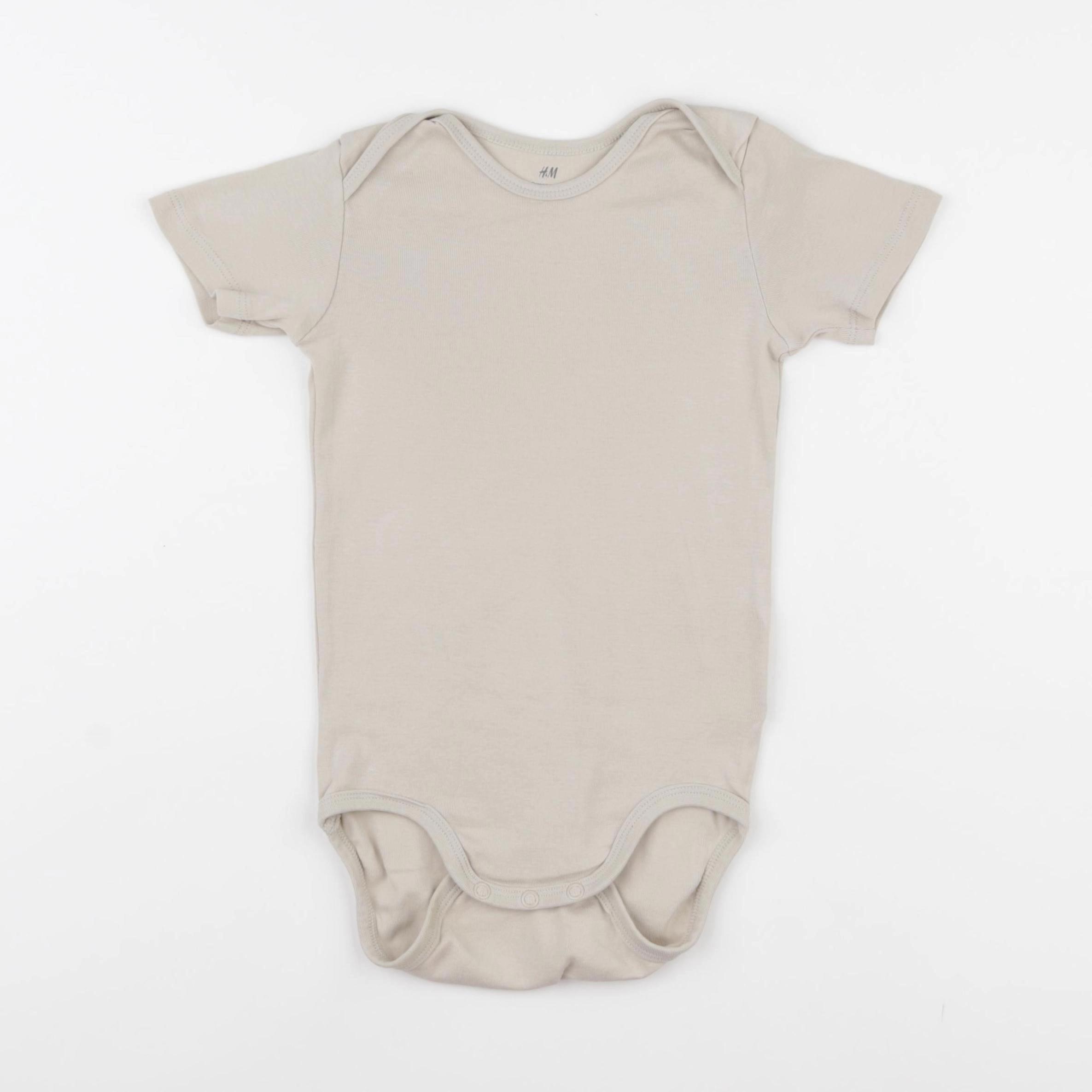 H&M - body beige - 2/3 ans