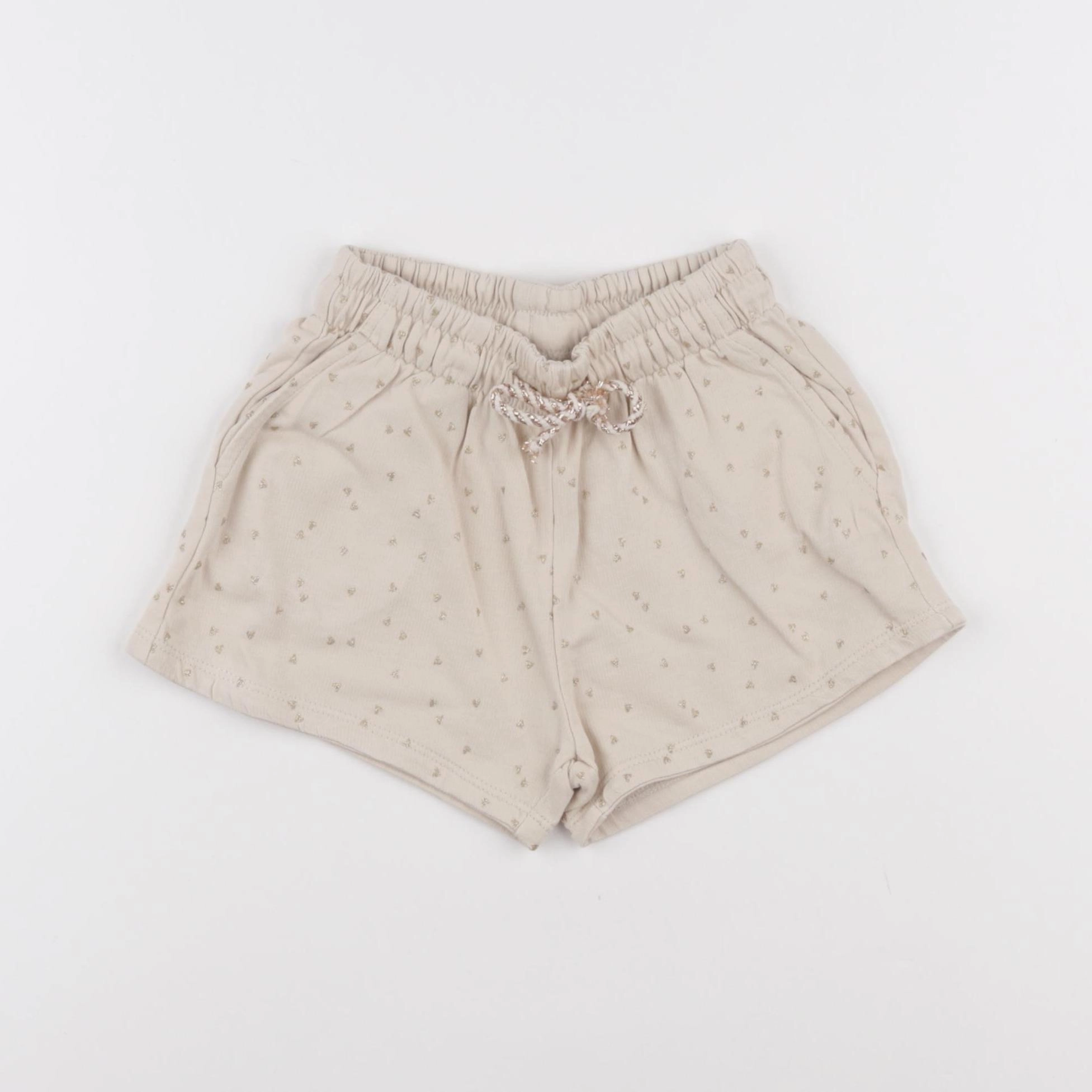 H&M - short beige - 2/3 ans