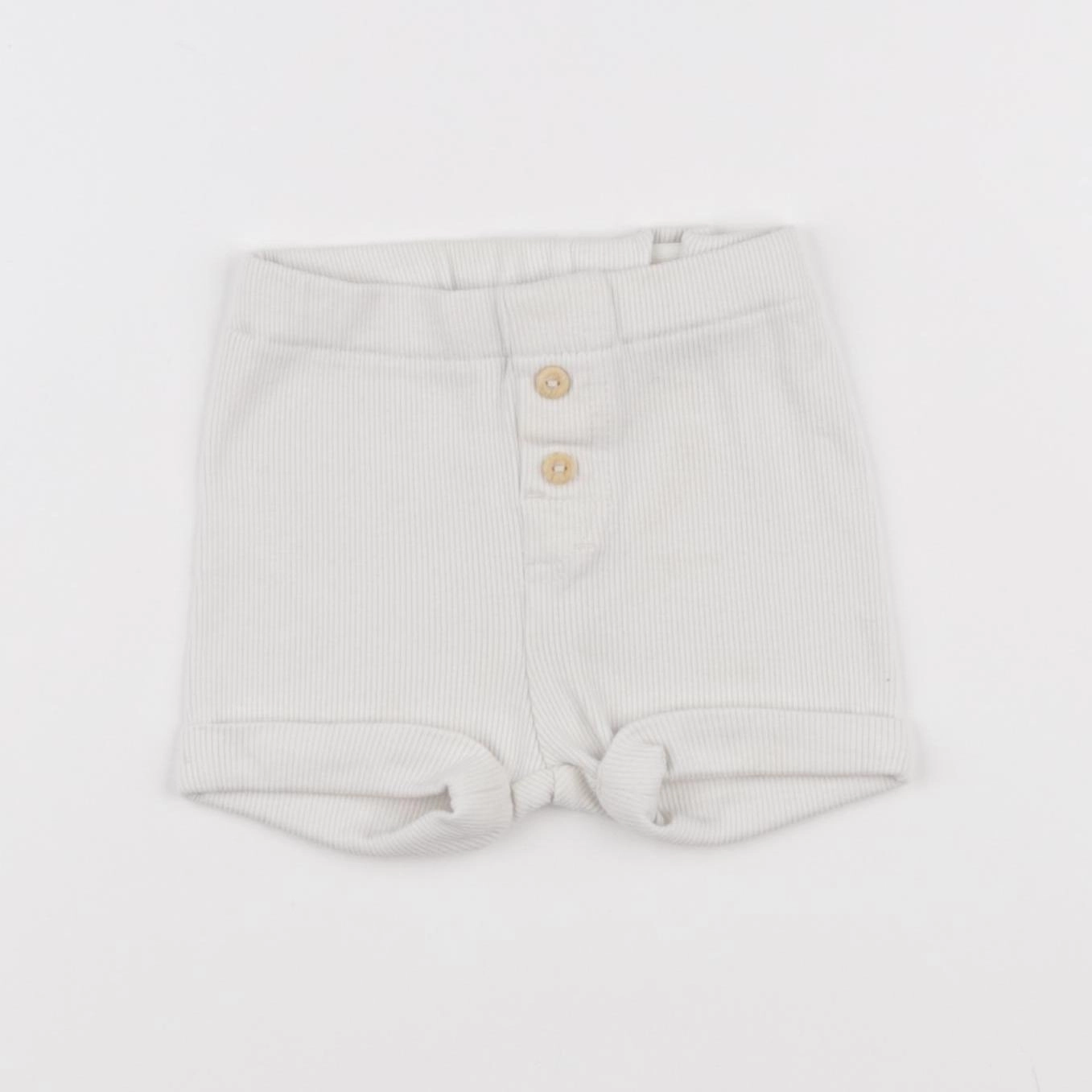 H&M - short blanc - 9 mois